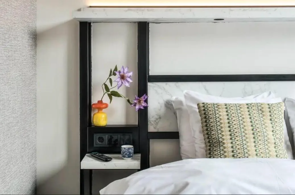 Bed in Boutique Hotel Lumiere