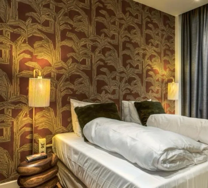 Bed in Boutique Hotel Lumiere