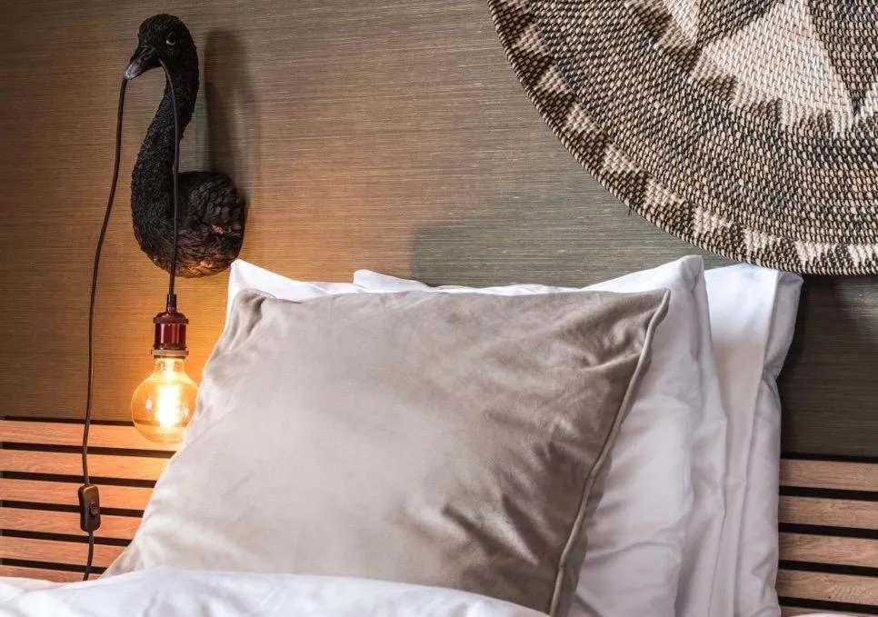 Bed in Boutique Hotel Lumiere