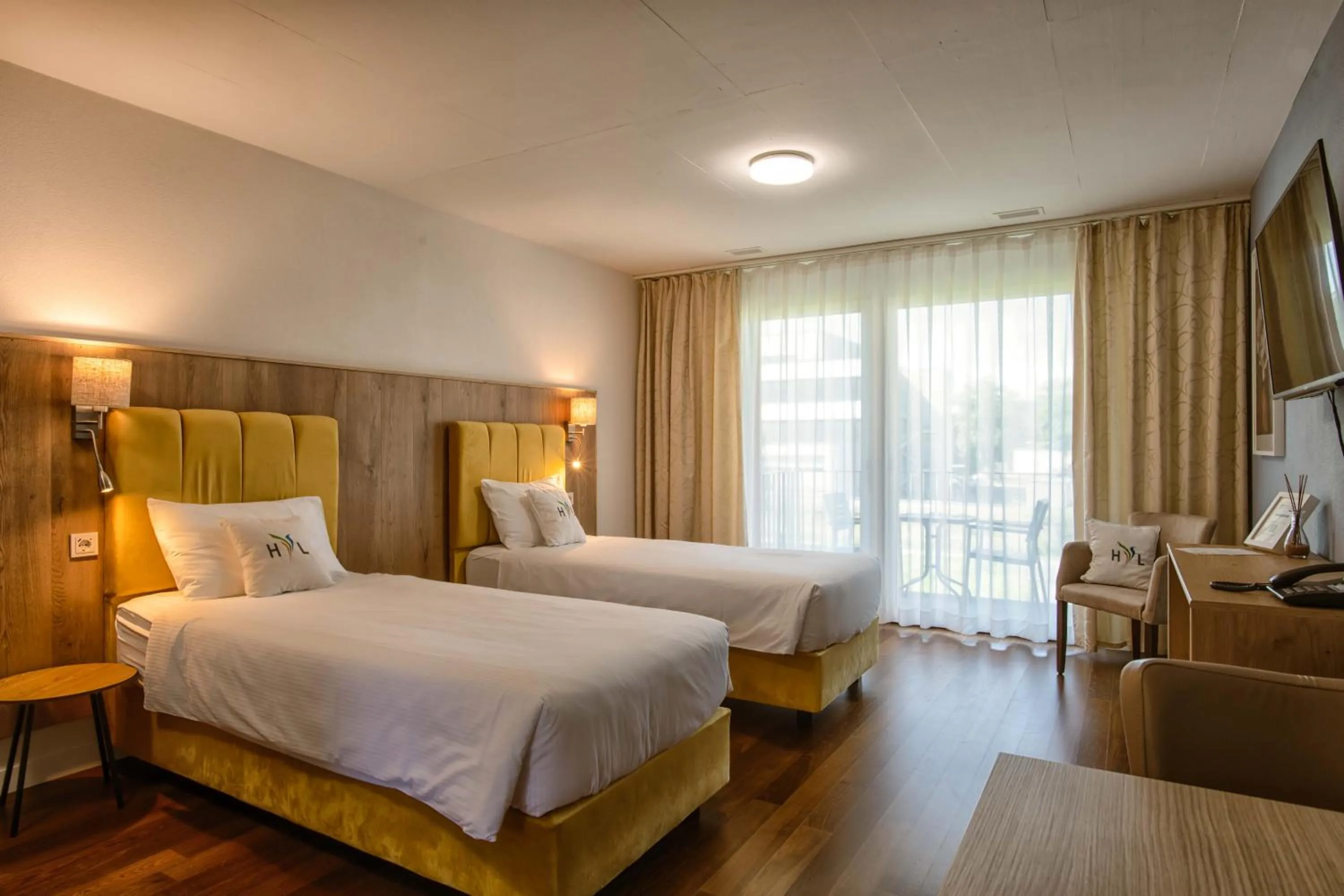 Bed in Hotel Residence Loren - contact & contactless check-in