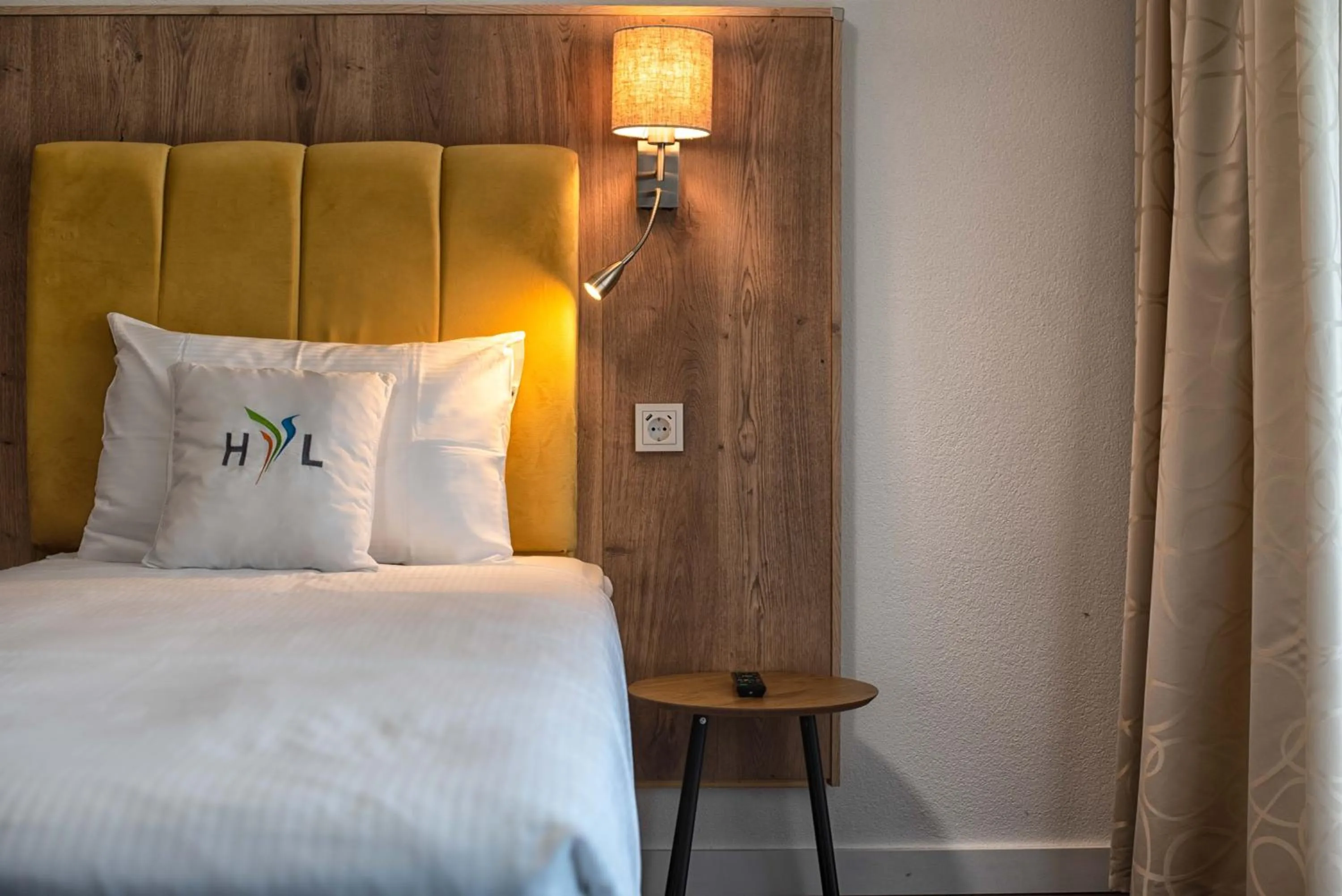 Bed in Hotel Residence Loren - contact & contactless check-in