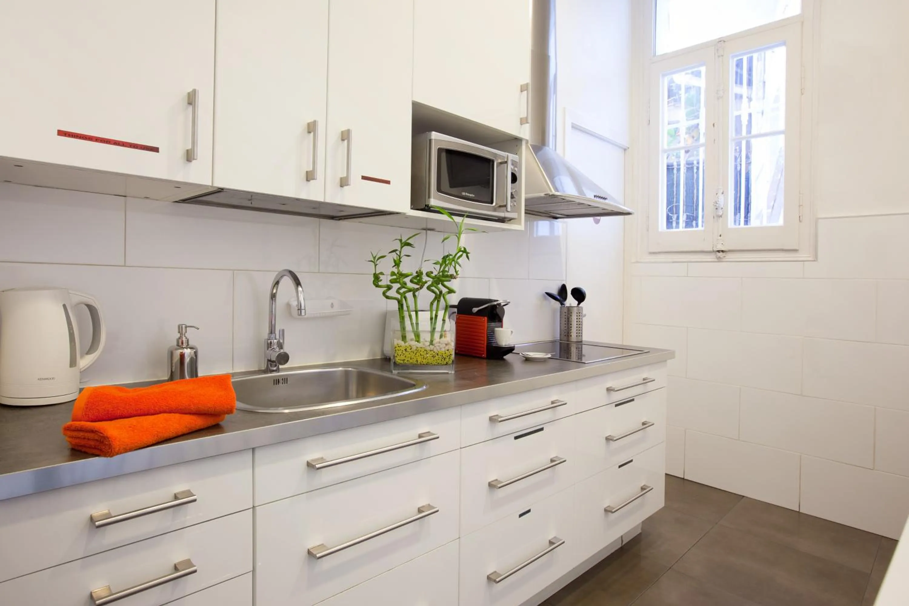 Communal kitchen in Hip Karma Hostel