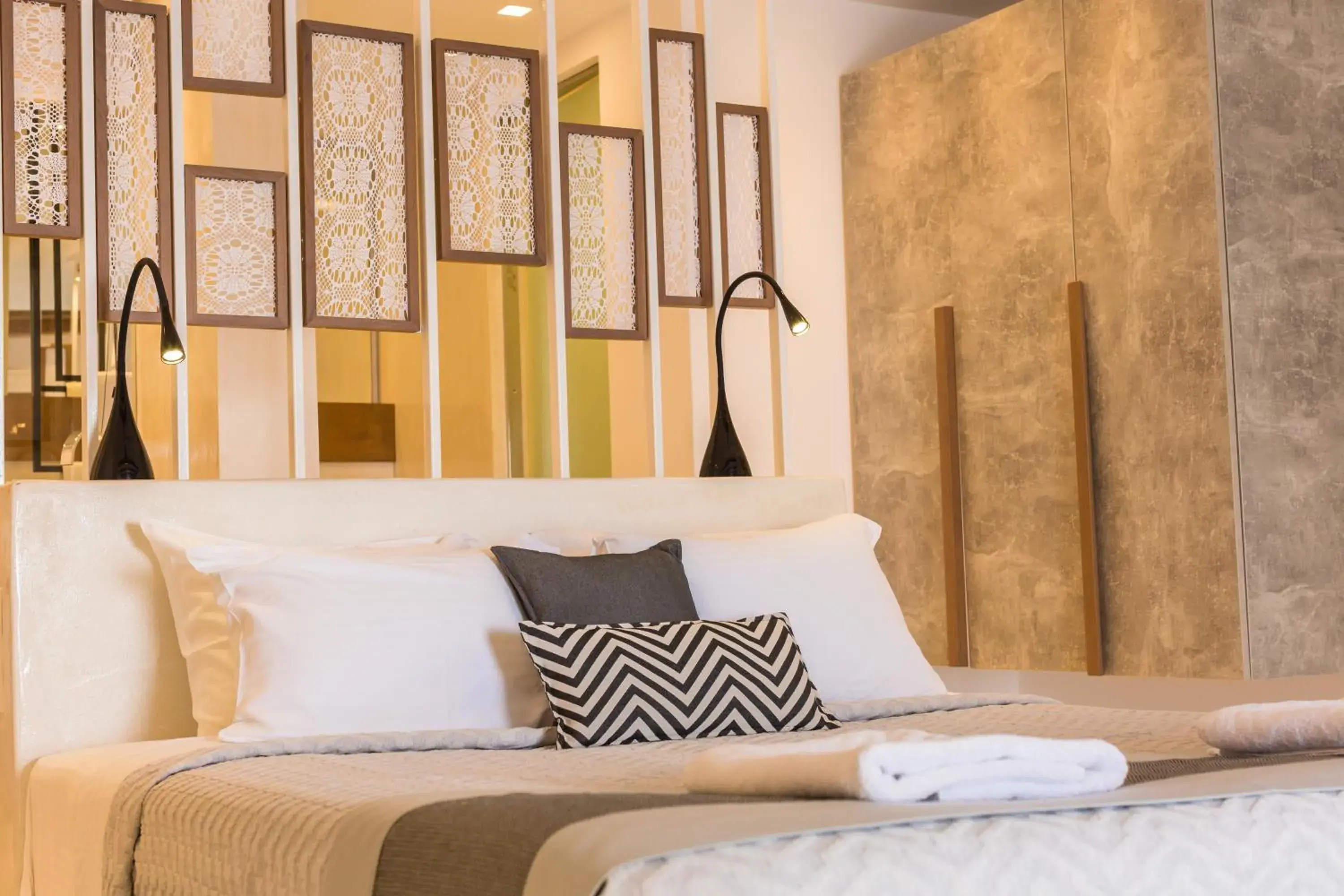 Bed in Oia Suites Bed in Oia Suites