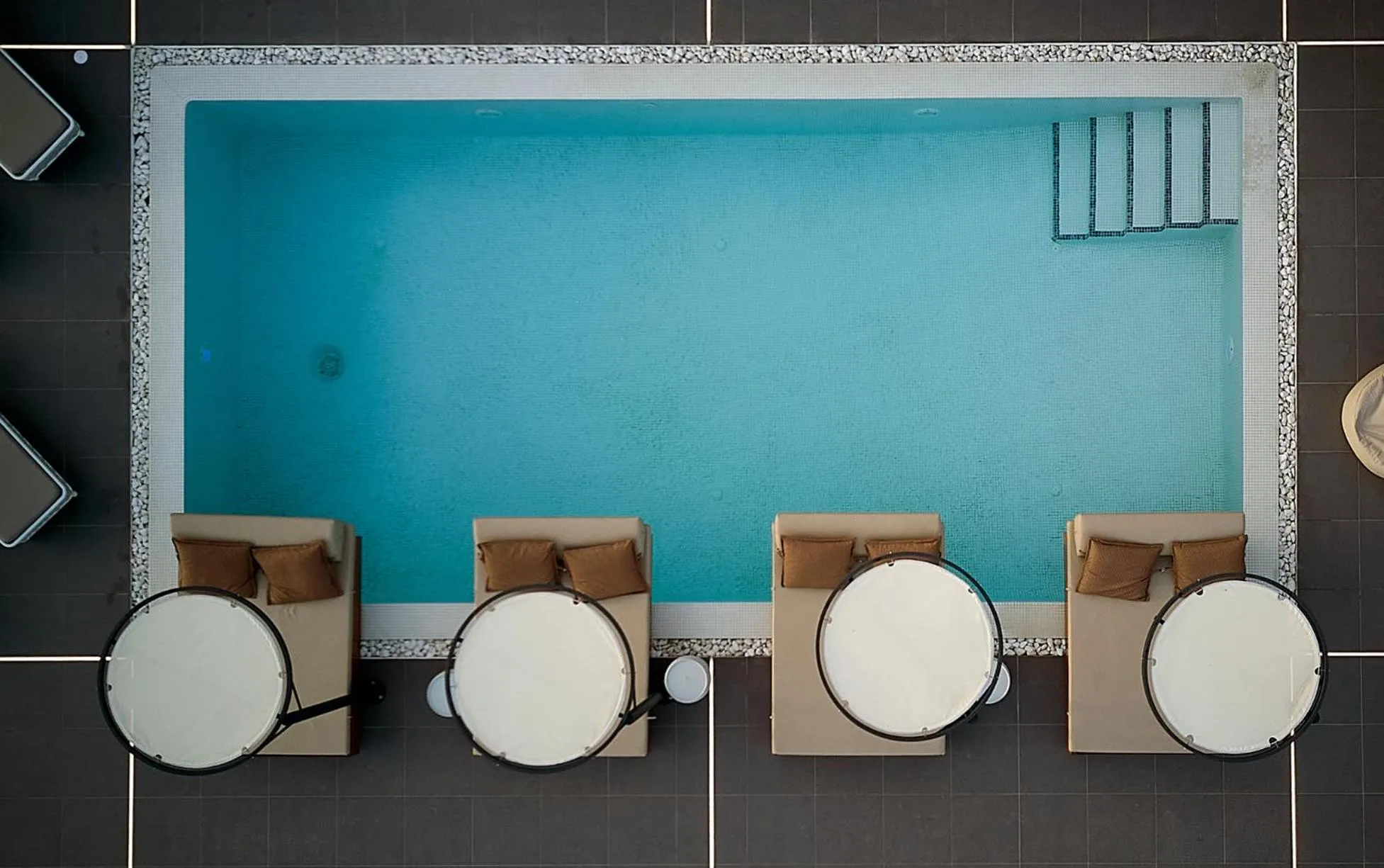 Swimming pool in Oia Suites