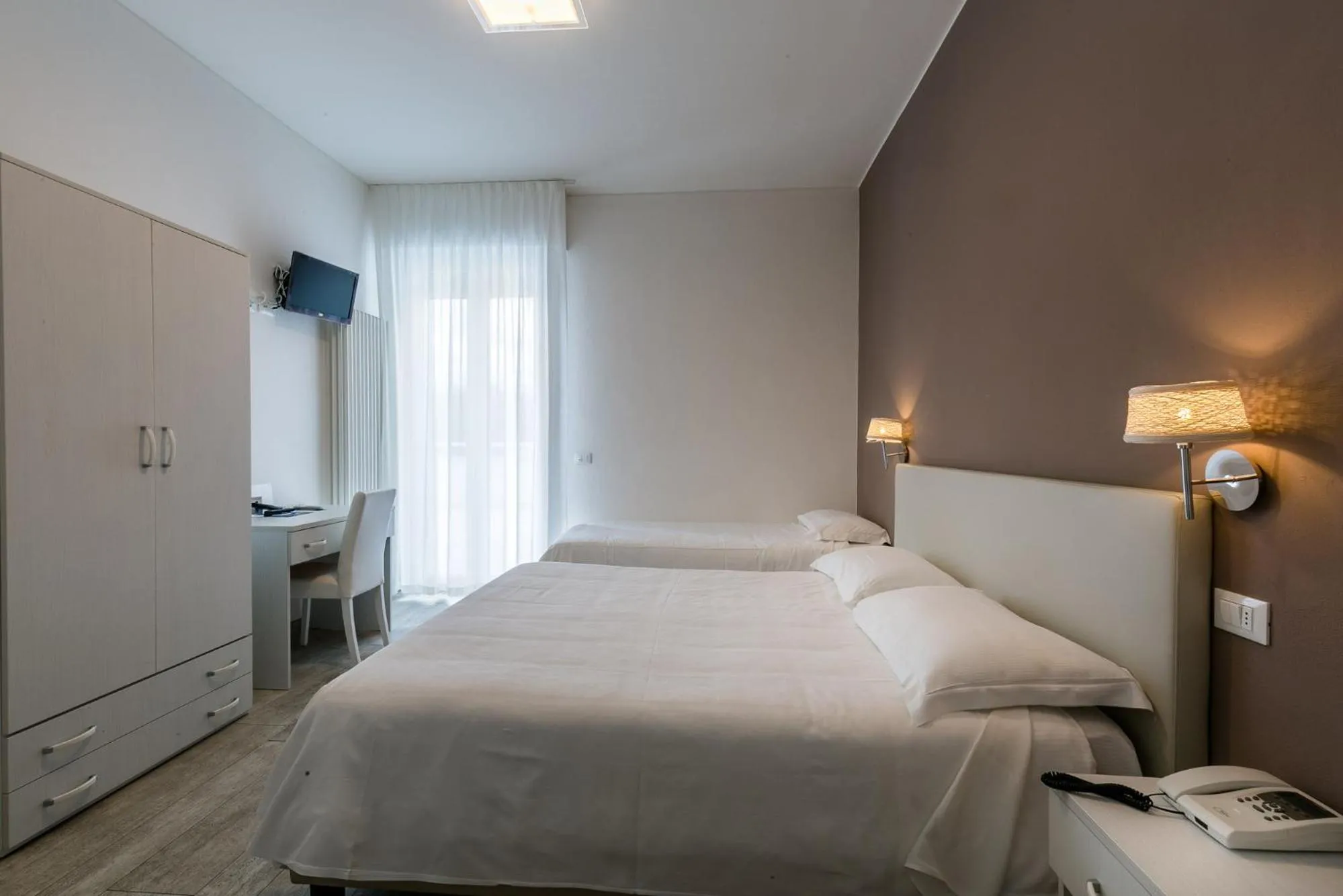 Bed in Hotel Saviola
