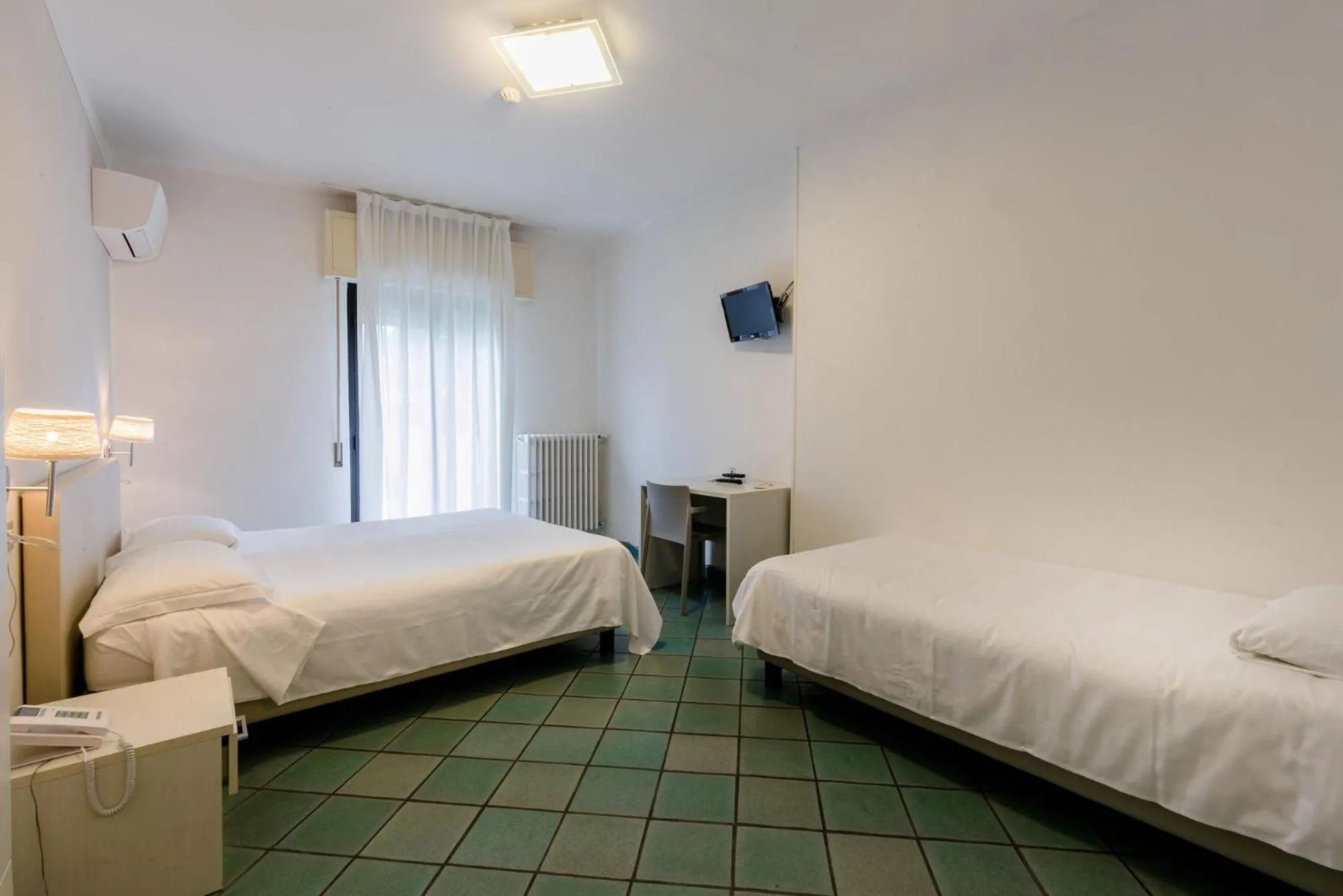 Bed in Hotel Saviola
