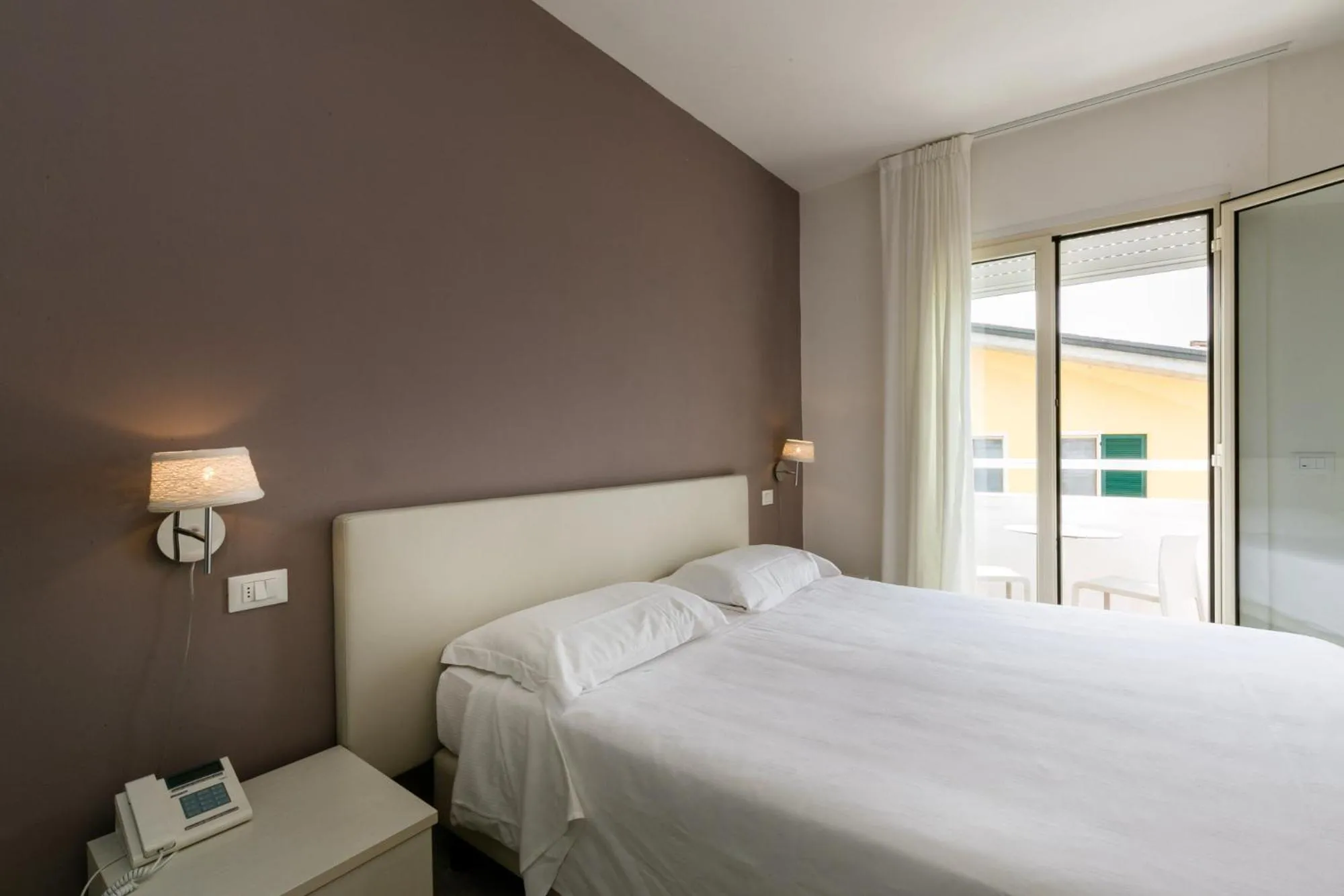 Bed in Hotel Saviola