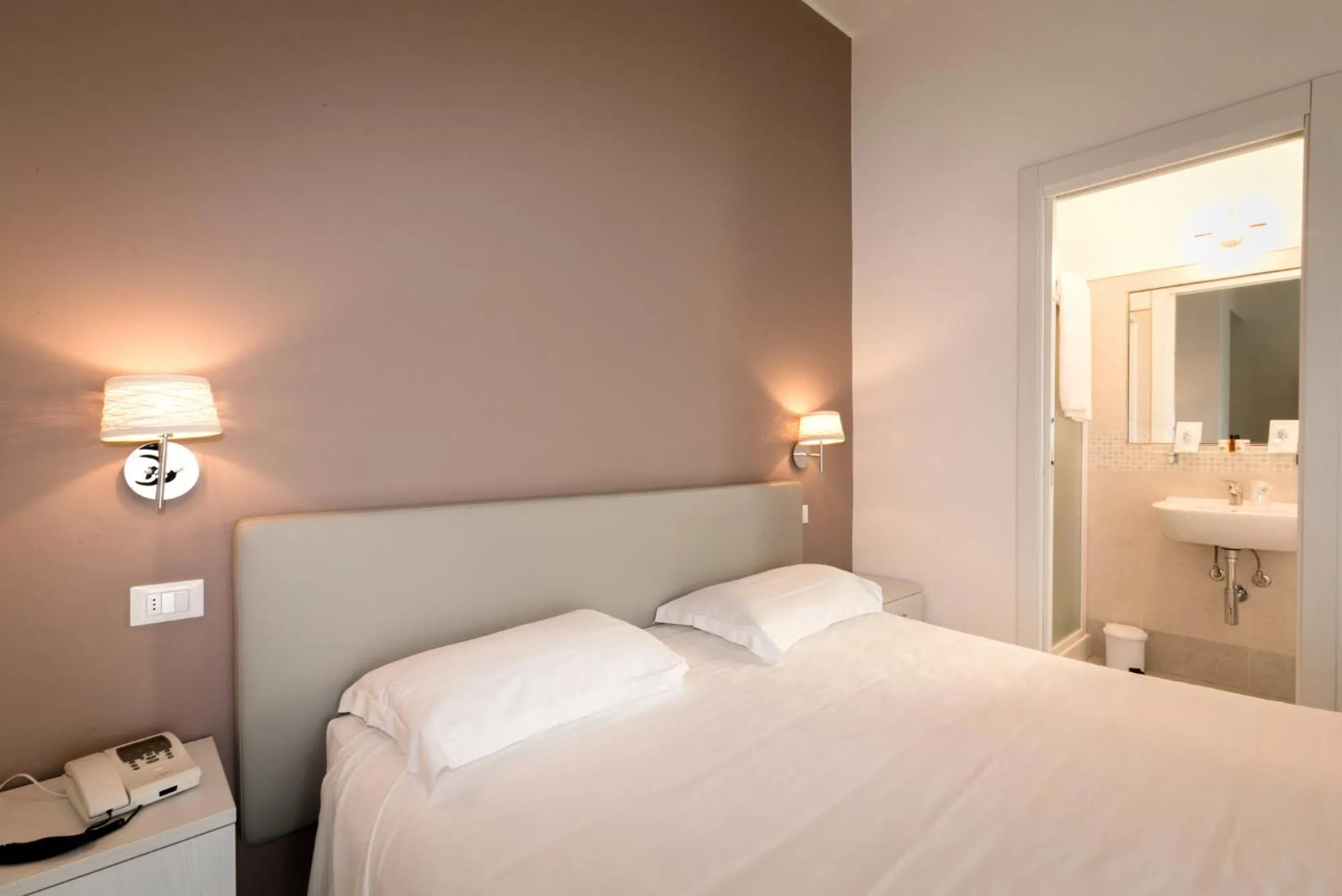 Bed in Hotel Saviola
