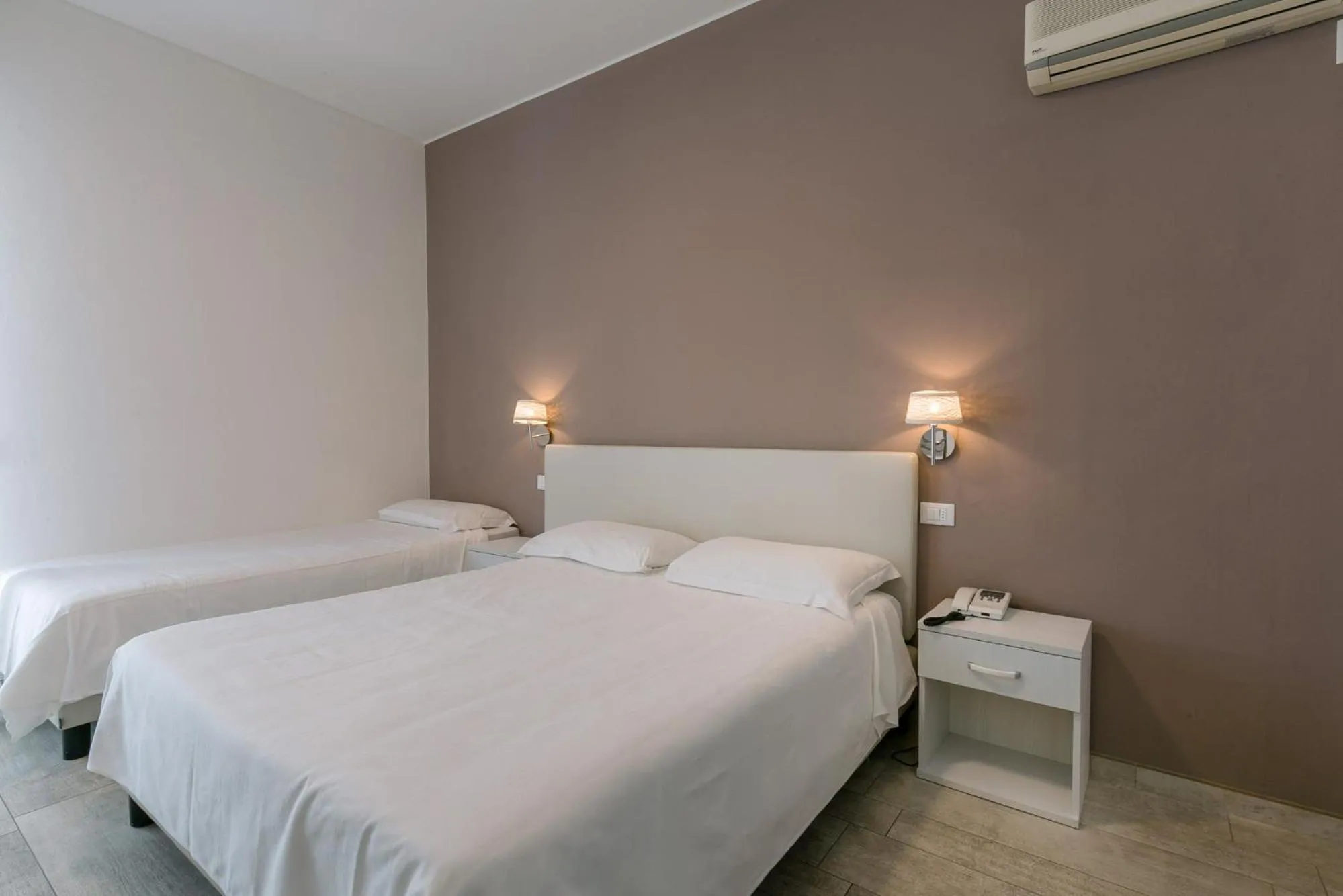 Bed in Hotel Saviola