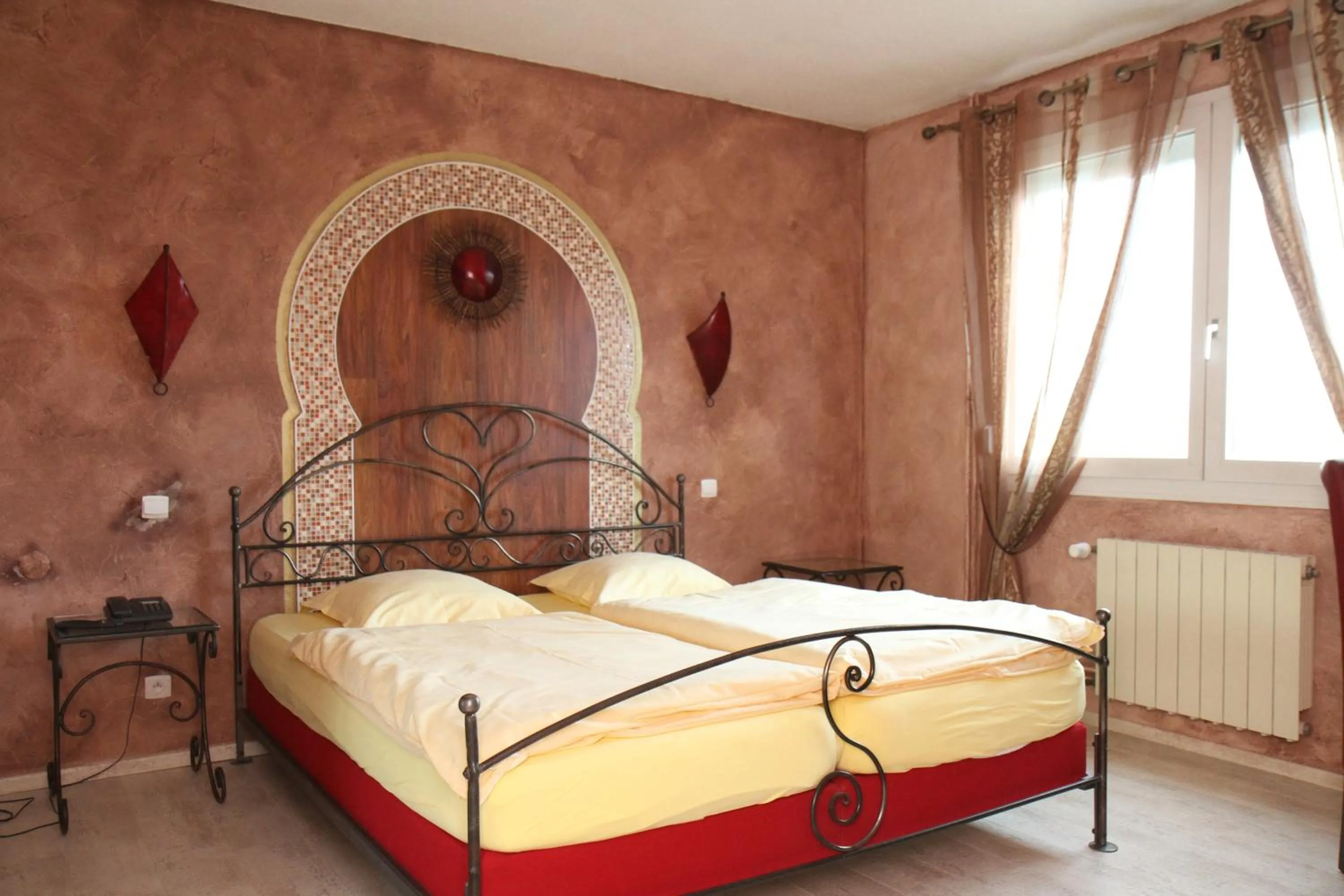 Decorative detail, Bed in Hotel Restaurant Champ Alsace