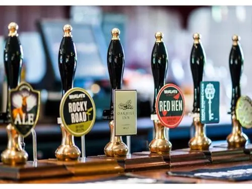 Lounge or bar in The Oakhill Inn