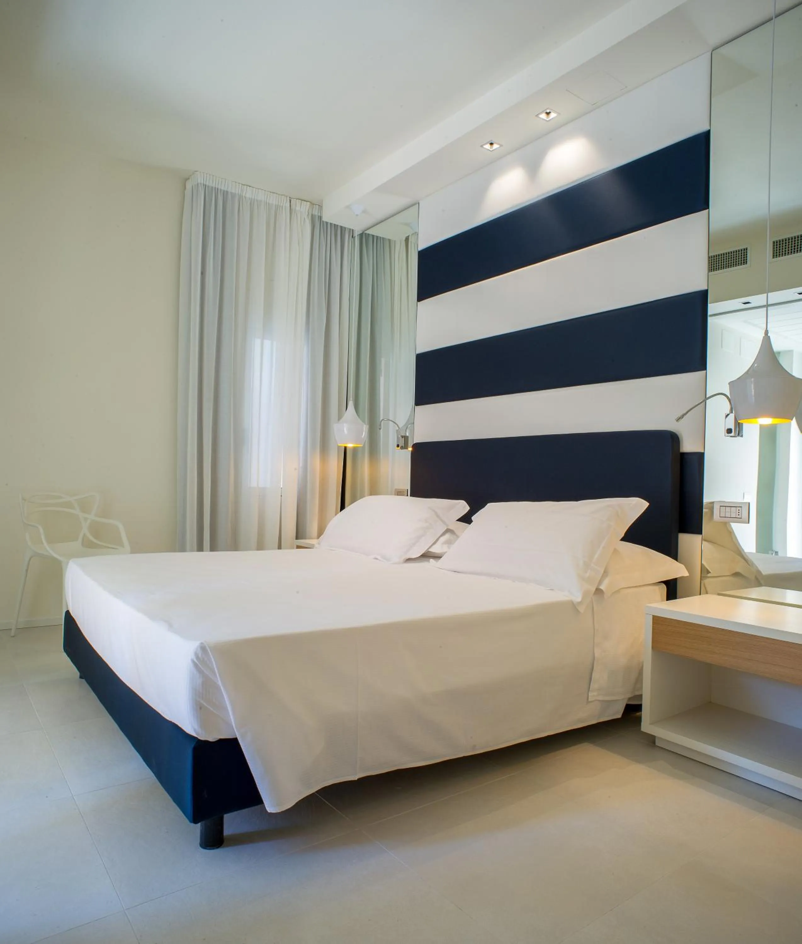 Bed in Metropol Ceccarini Suite - Luxury apartments