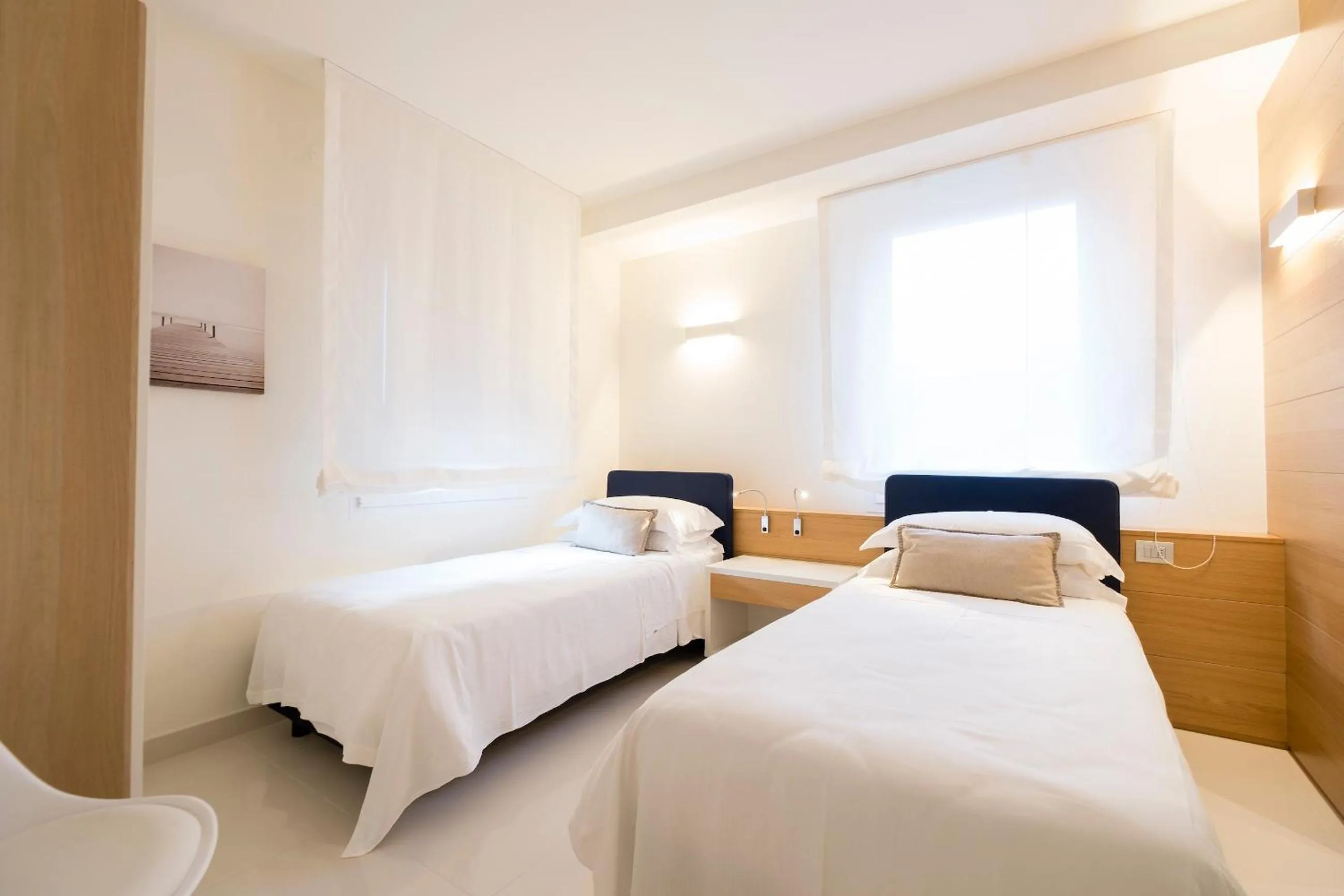 Bedroom, Bed in Metropol Ceccarini Suite - Luxury apartments
