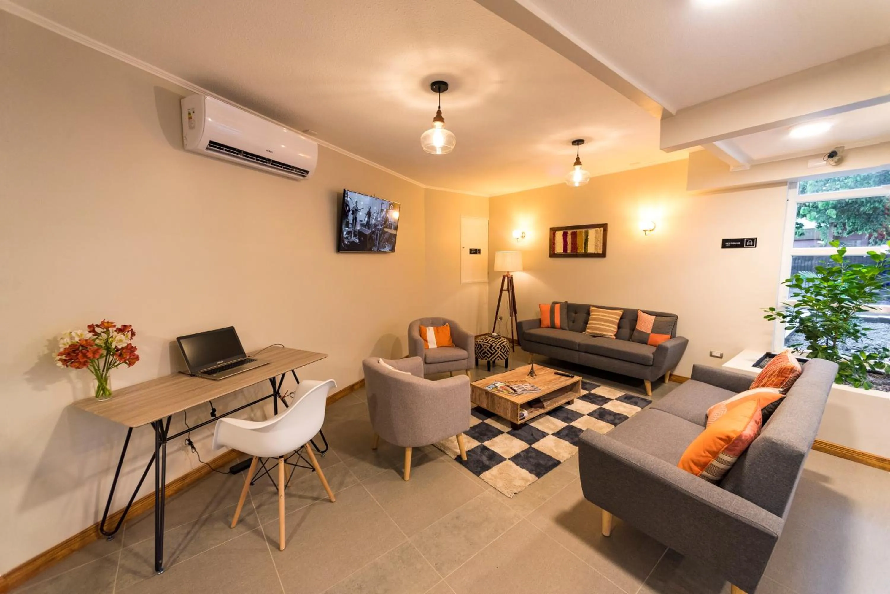 Communal lounge/ TV room in Hotel Insigne