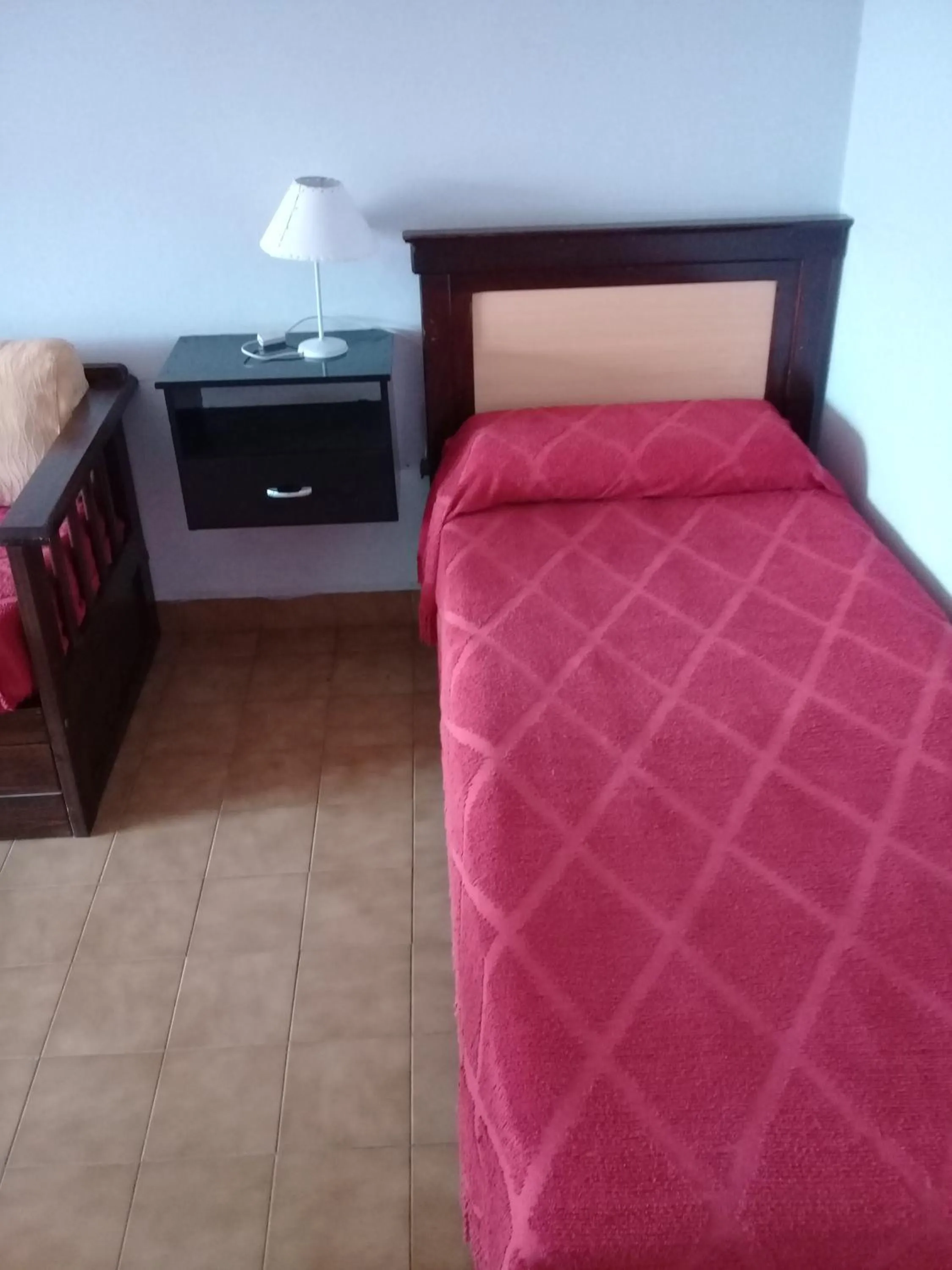 Bed in Apart Hotel Marilian