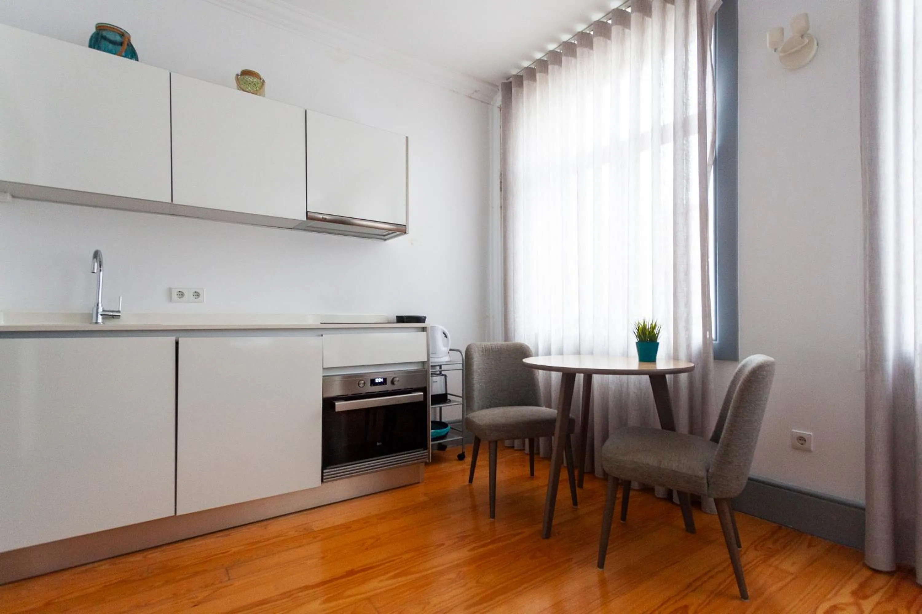Kitchen or kitchenette in Citybreak-apartments Coliseu