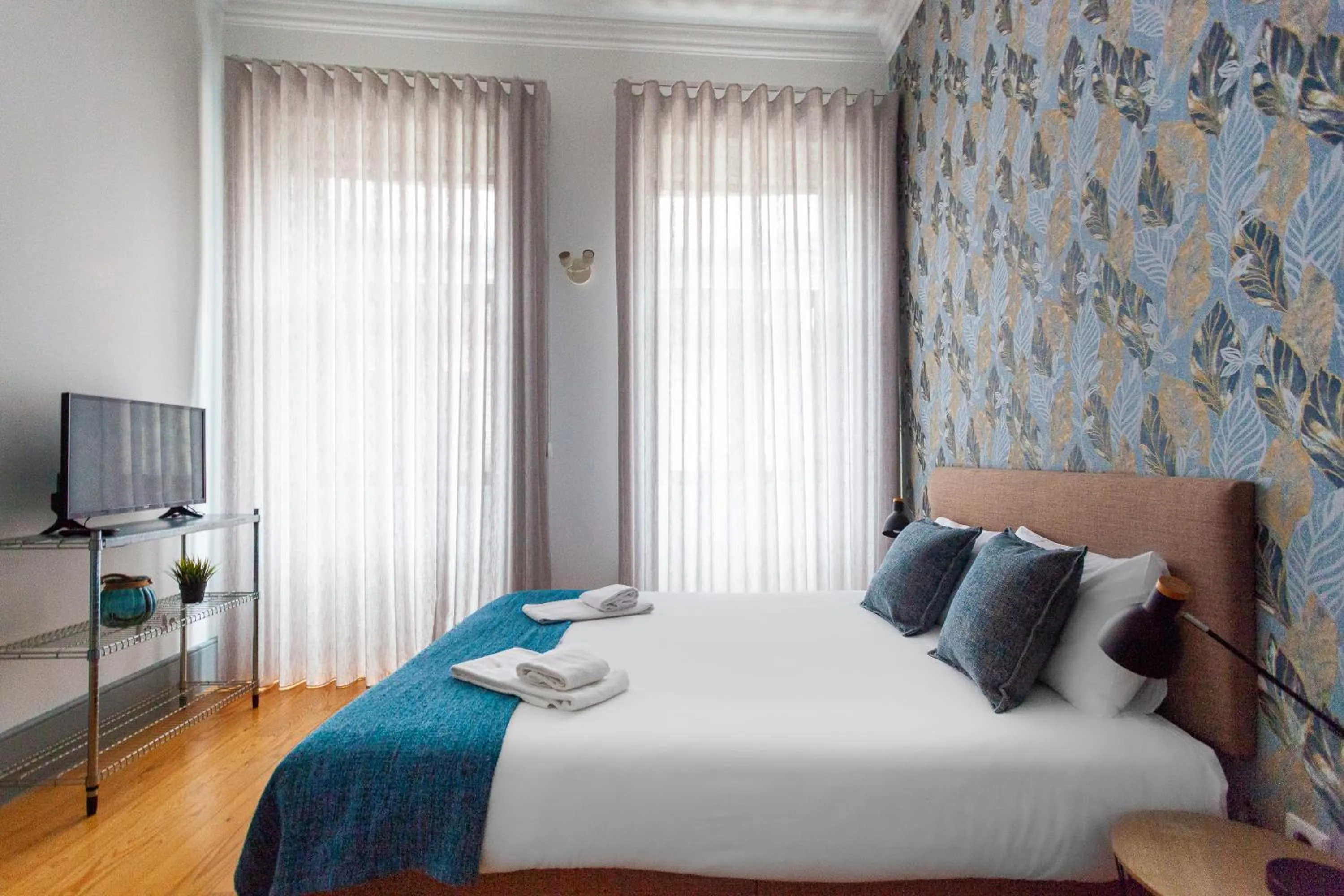 Bed in Citybreak-apartments Coliseu