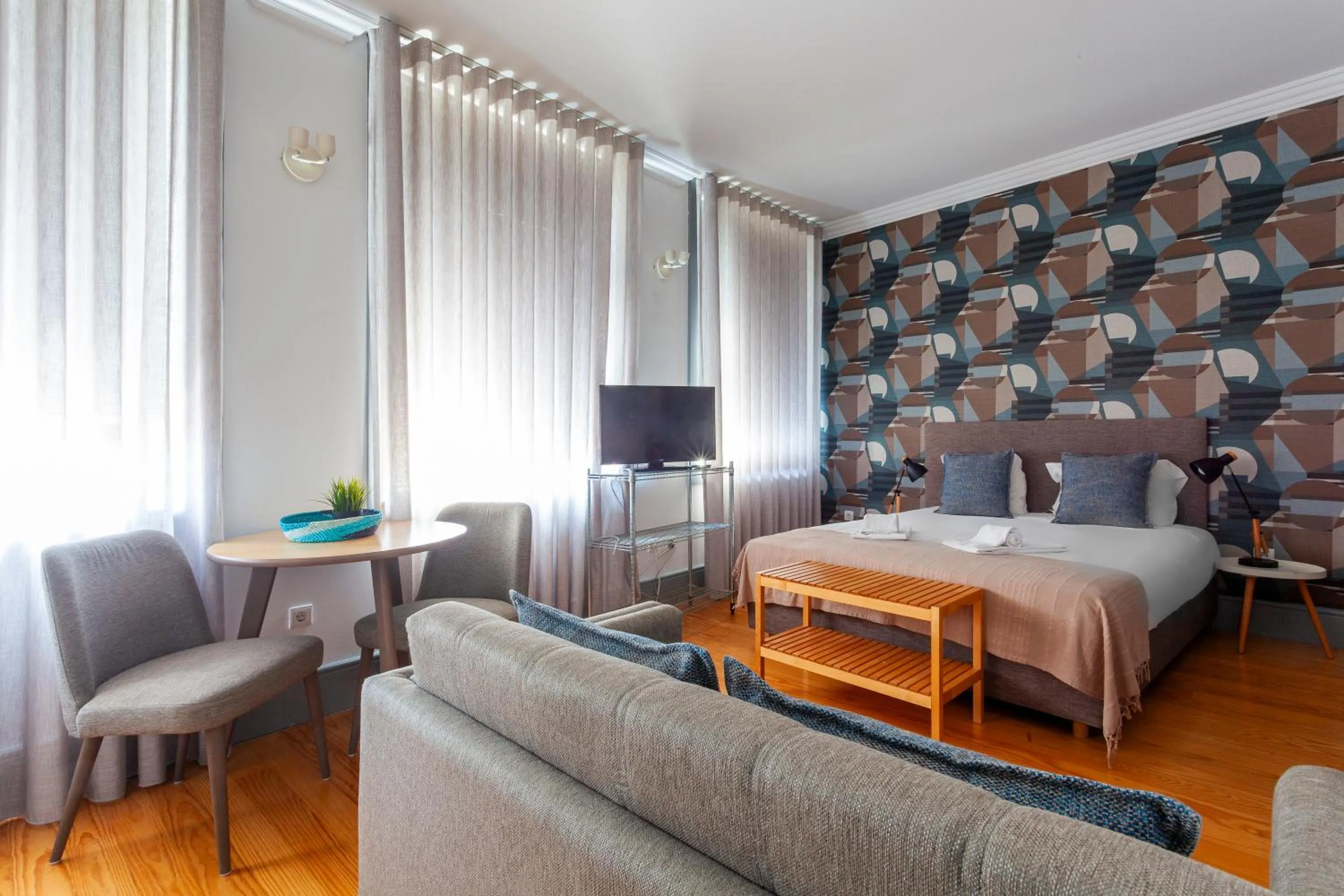 TV and multimedia, Bed in Citybreak-apartments Coliseu