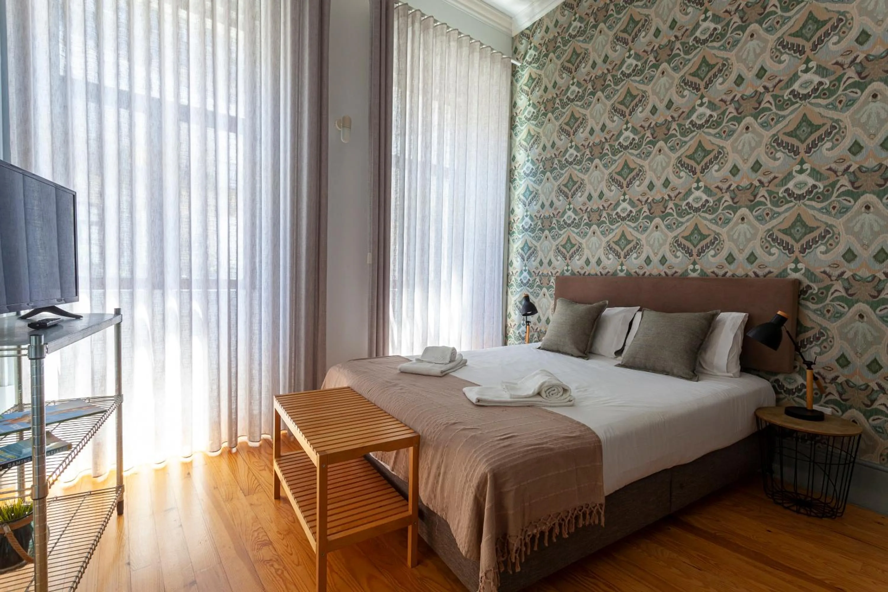Bed in Citybreak-apartments Coliseu