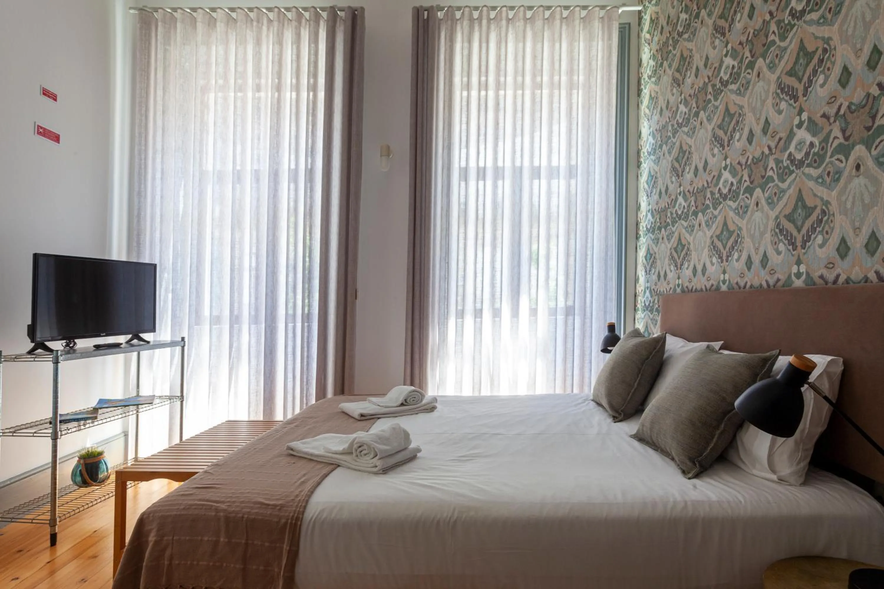 Bed in Citybreak-apartments Coliseu