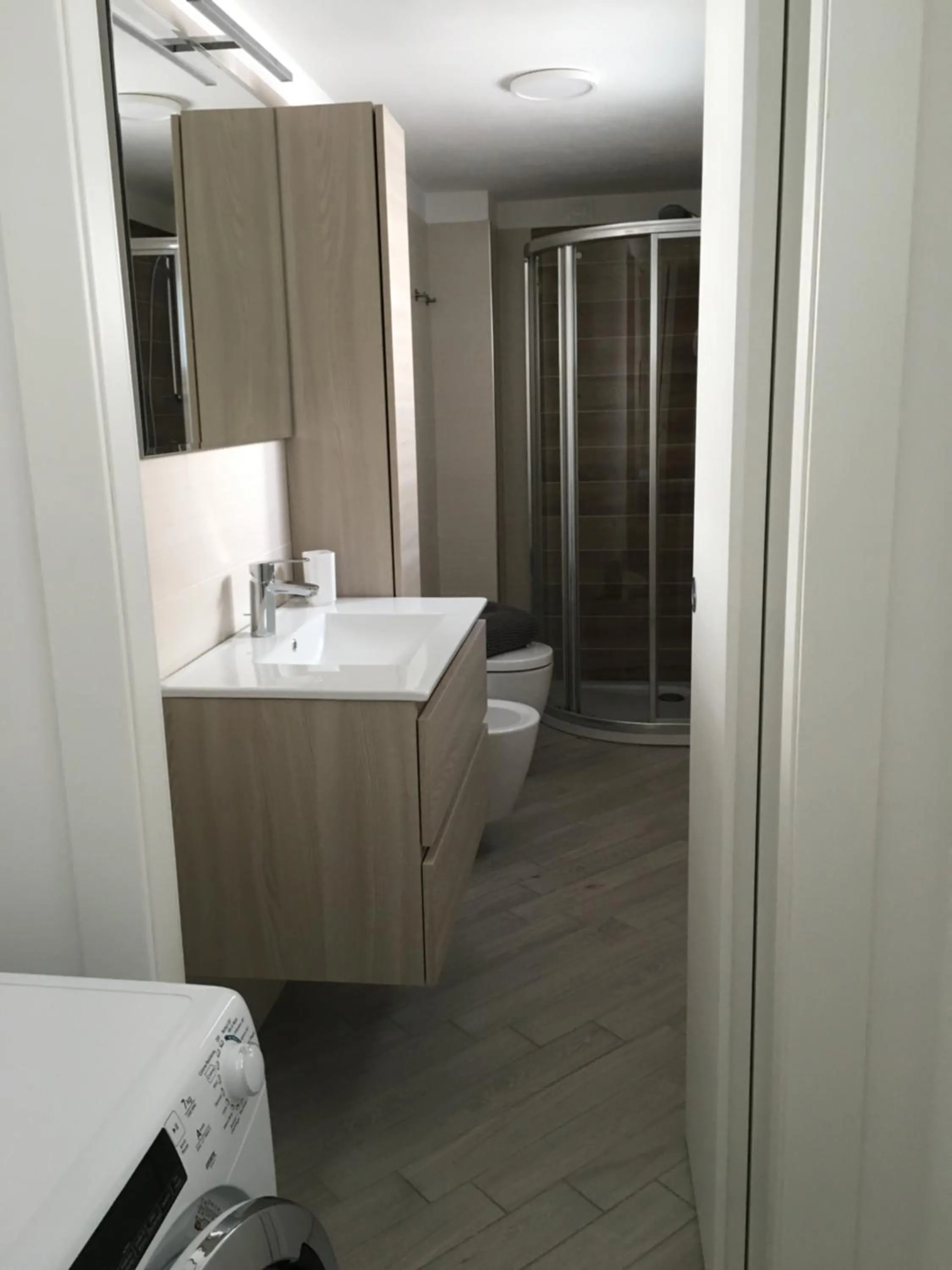 Shower, Bed in Home Hotel