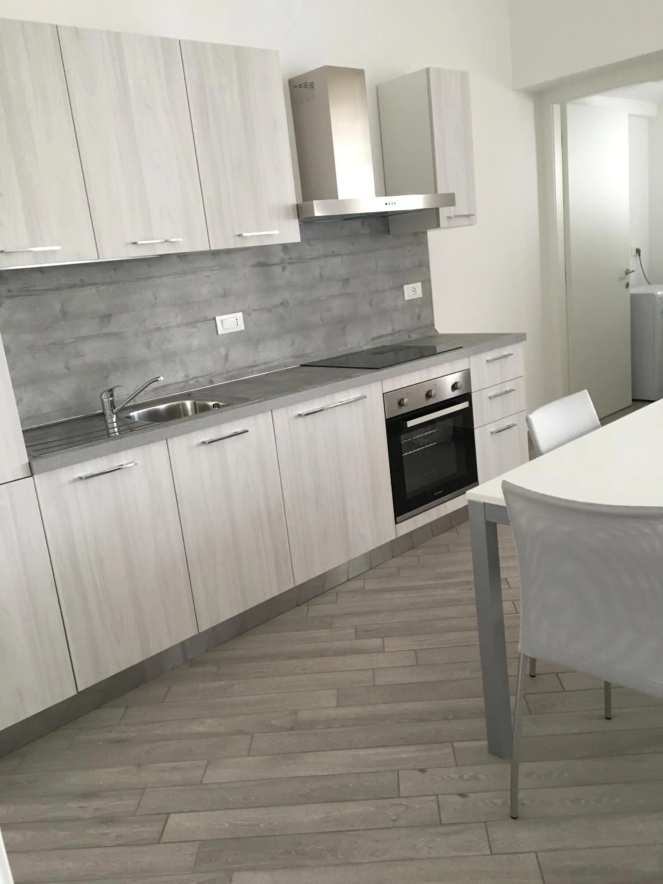 Kitchen or kitchenette in Home Hotel