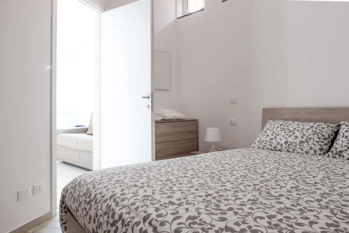 Photo of the whole room, Bed in Home Hotel