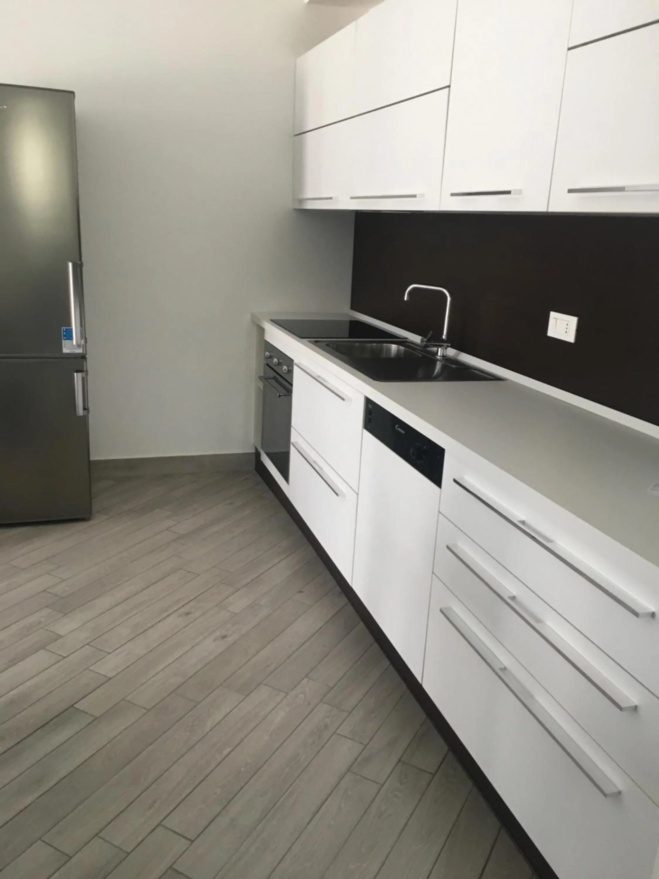 Kitchen or kitchenette in Home Hotel