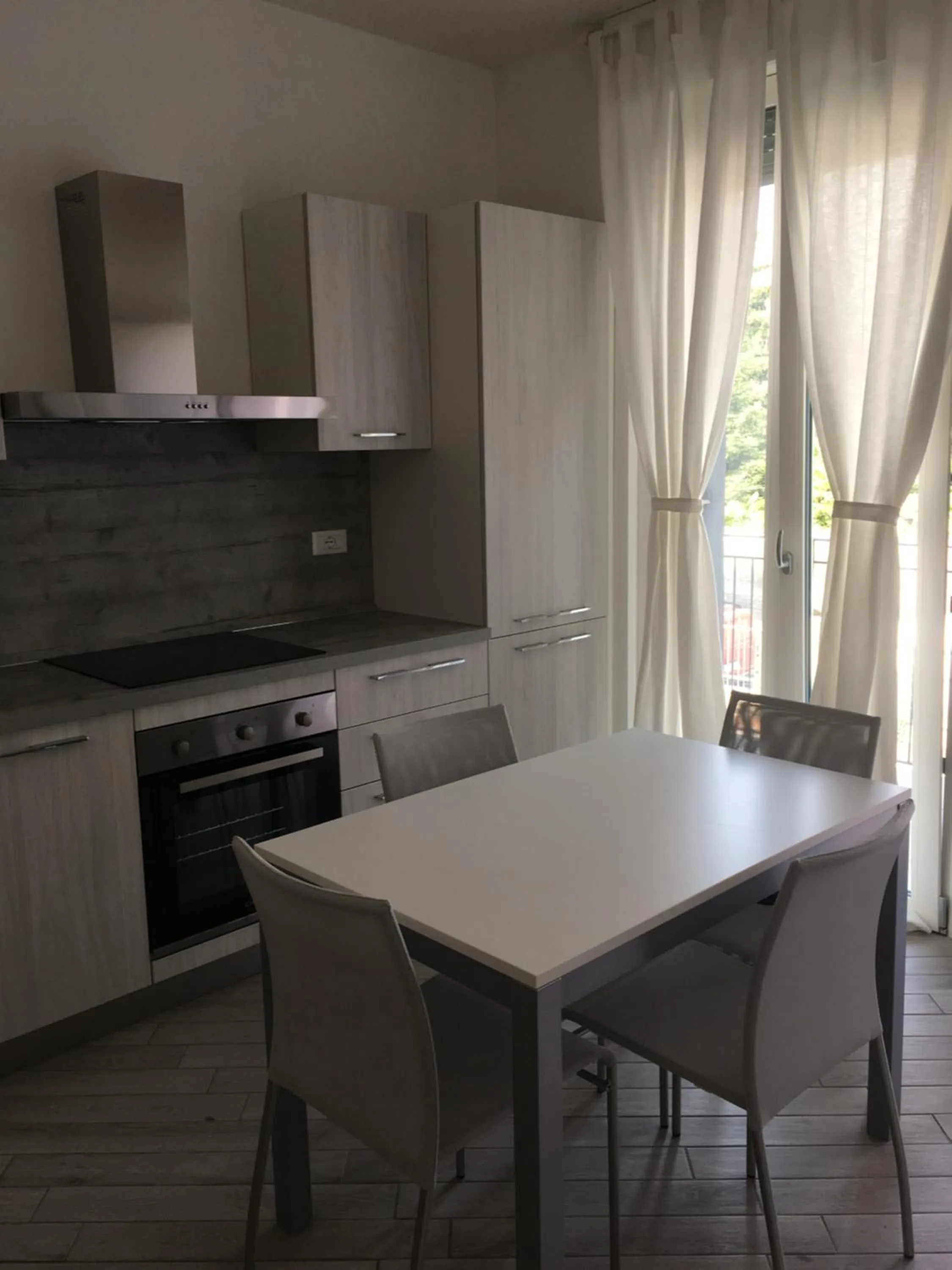 Kitchen or kitchenette in Home Hotel