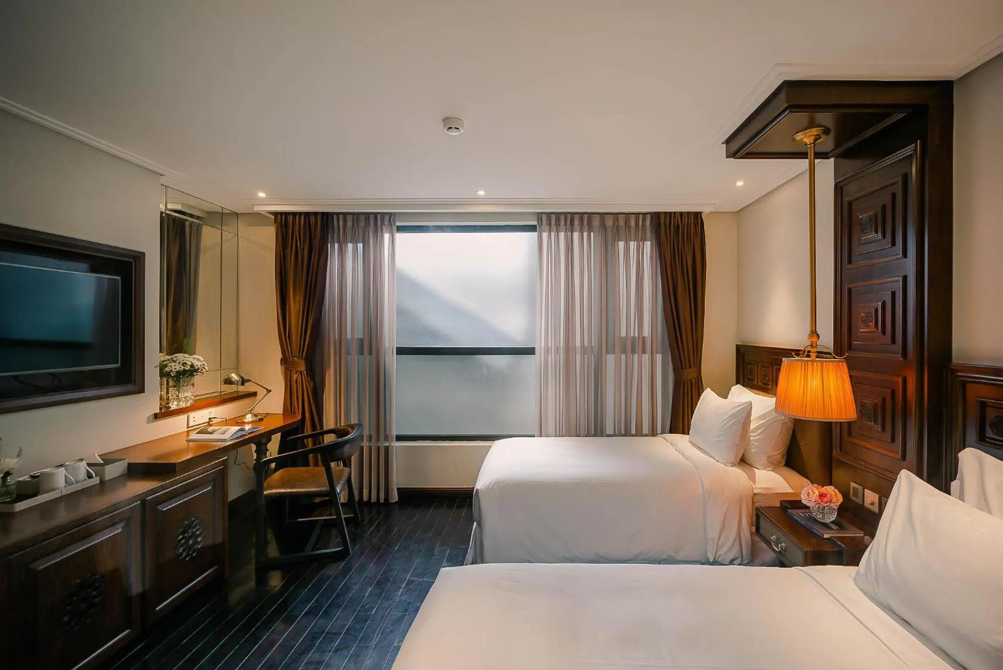 Bed in Le Jardin Hotel Haute Couture