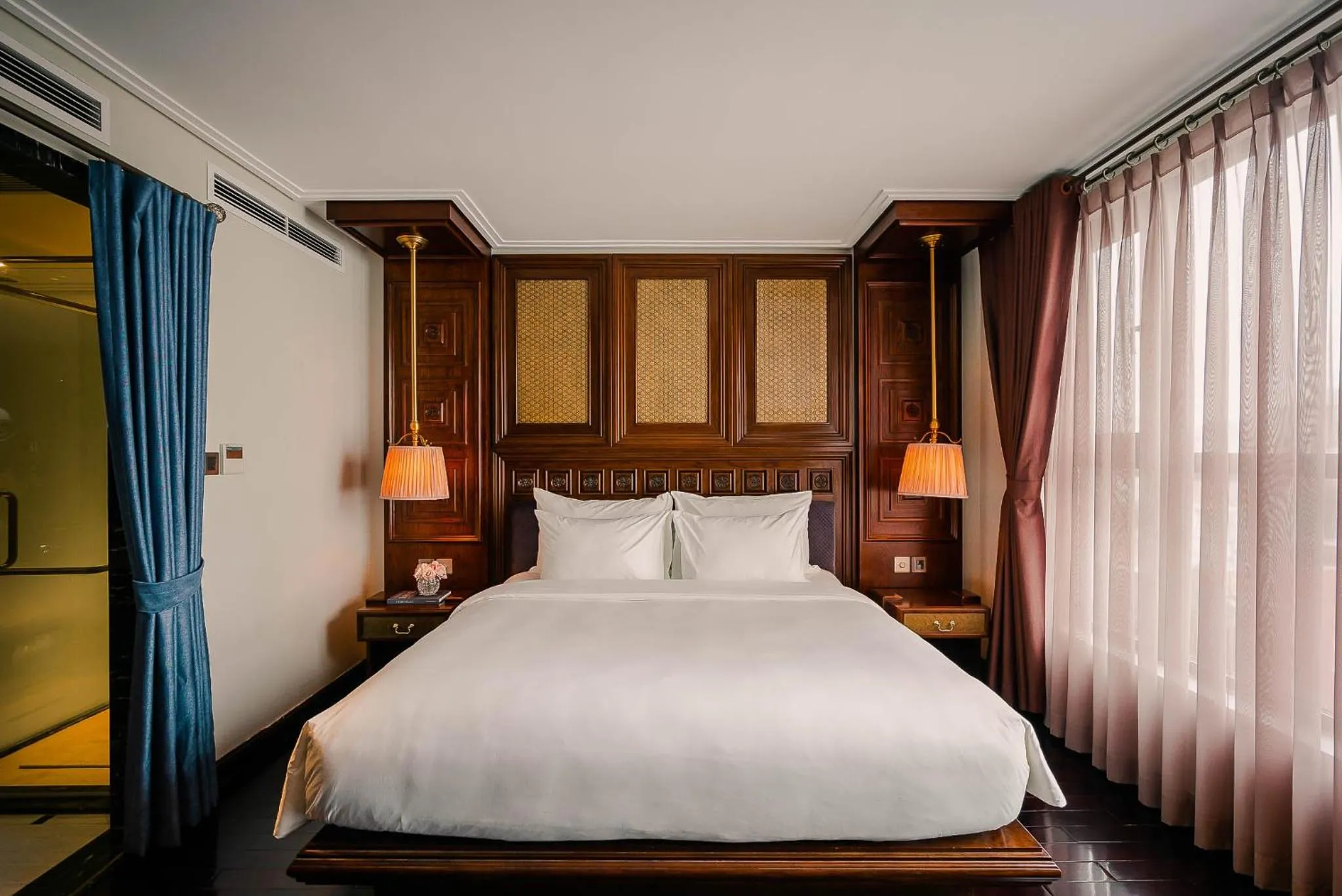 Bed in Le Jardin Hotel Haute Couture