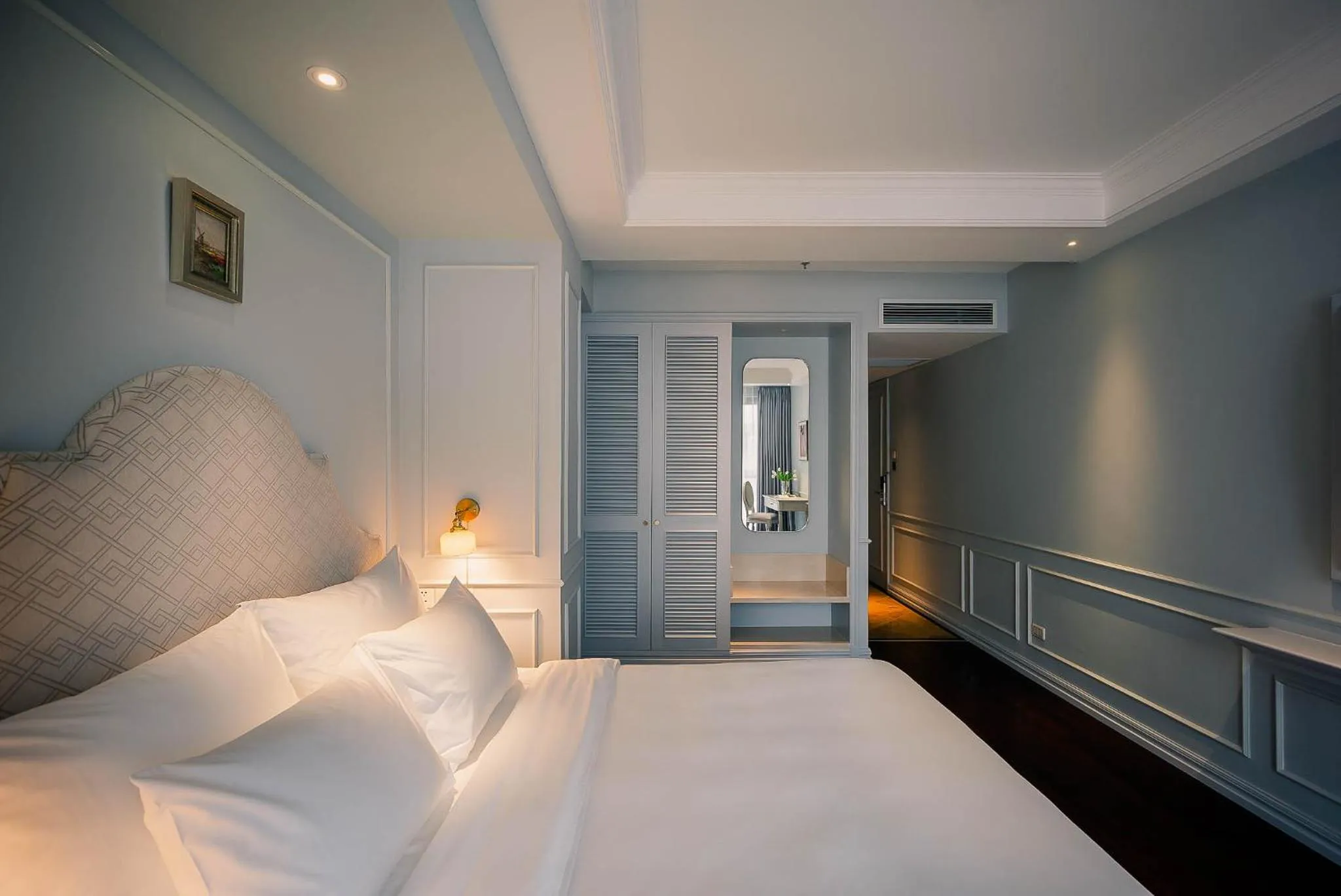 Bed in Le Jardin Hotel Haute Couture