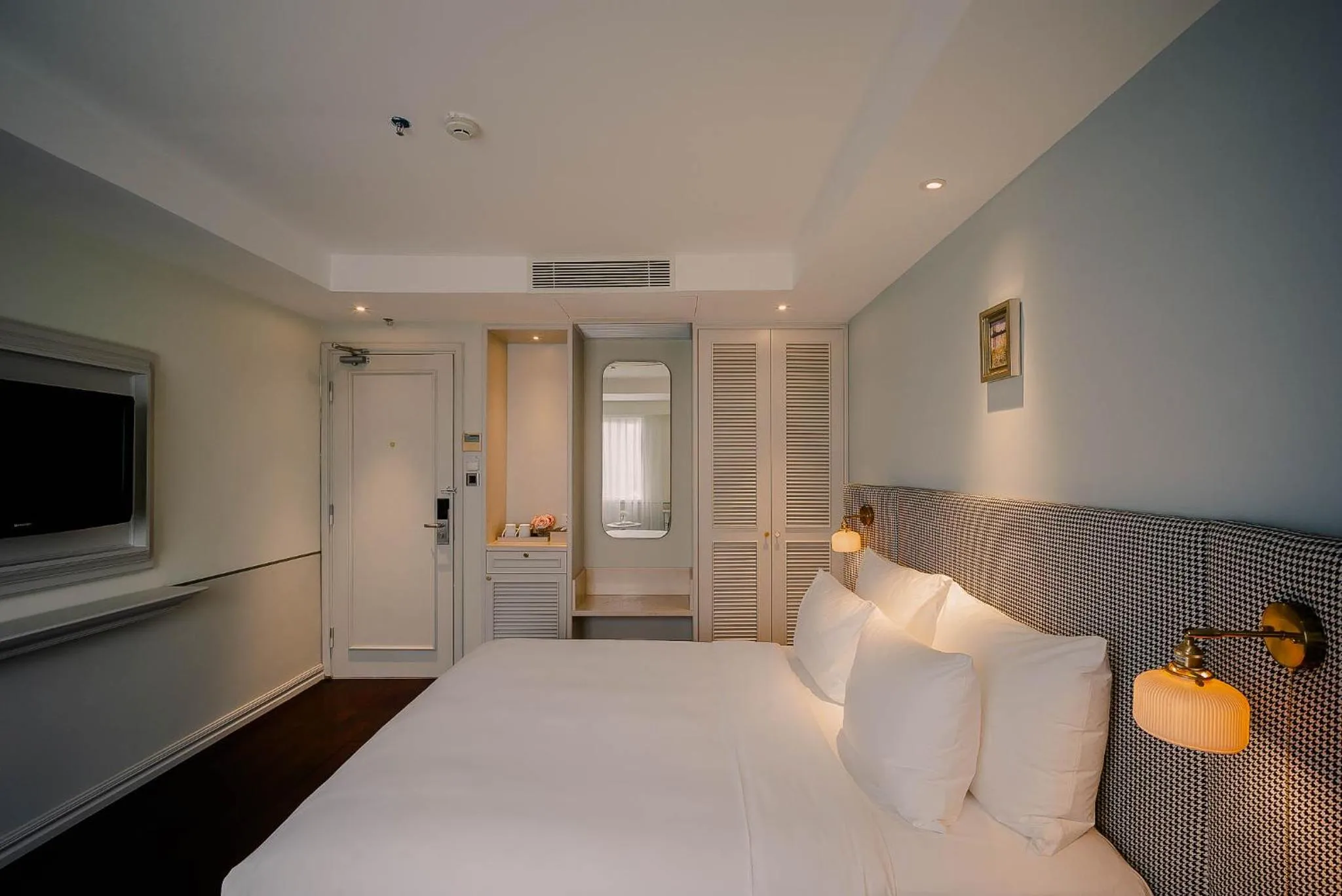 Bed in Le Jardin Hotel Haute Couture