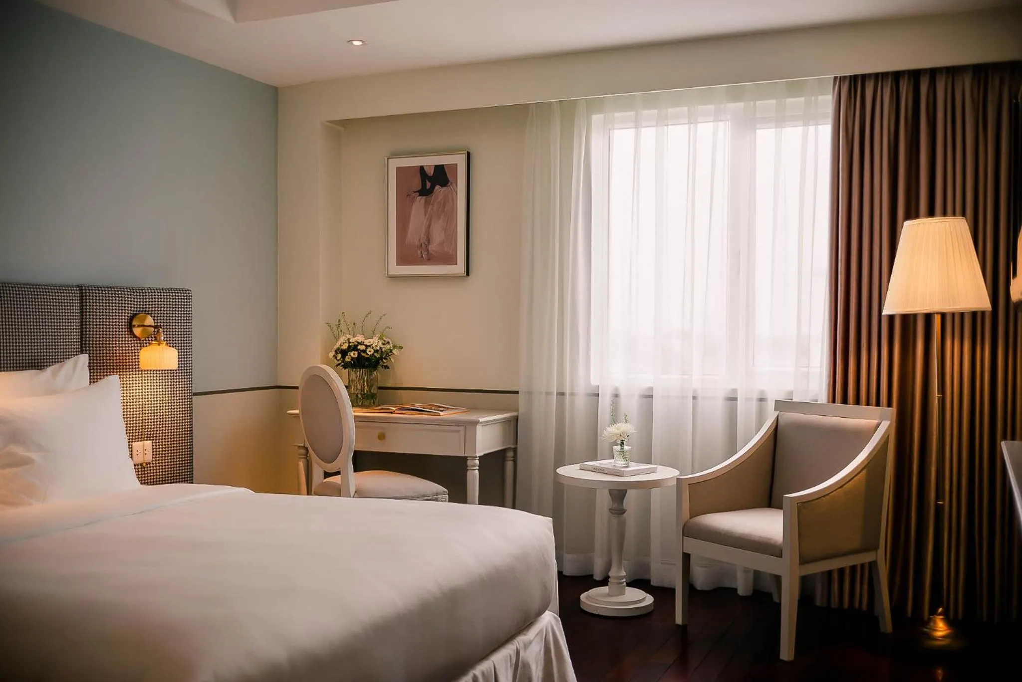 Bed in Le Jardin Hotel Haute Couture