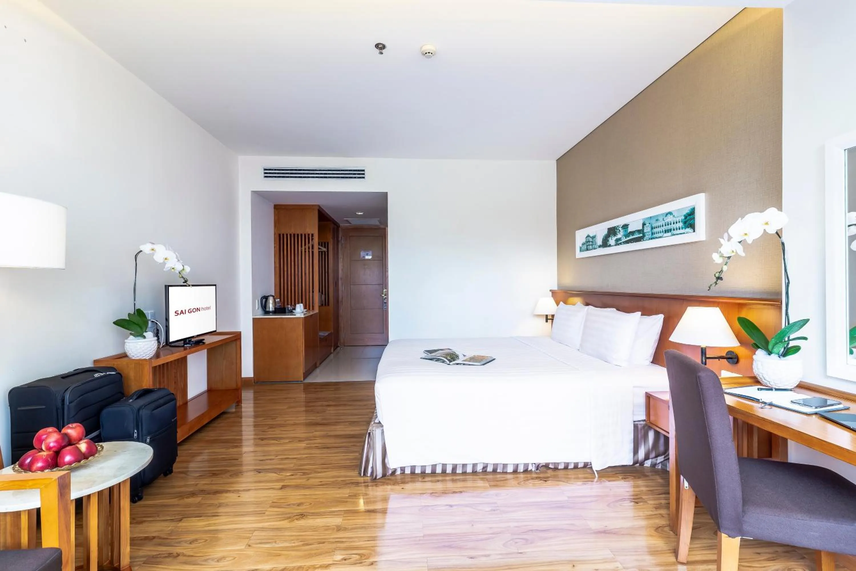 Photo of the whole room, Bed in Saigon Hotel