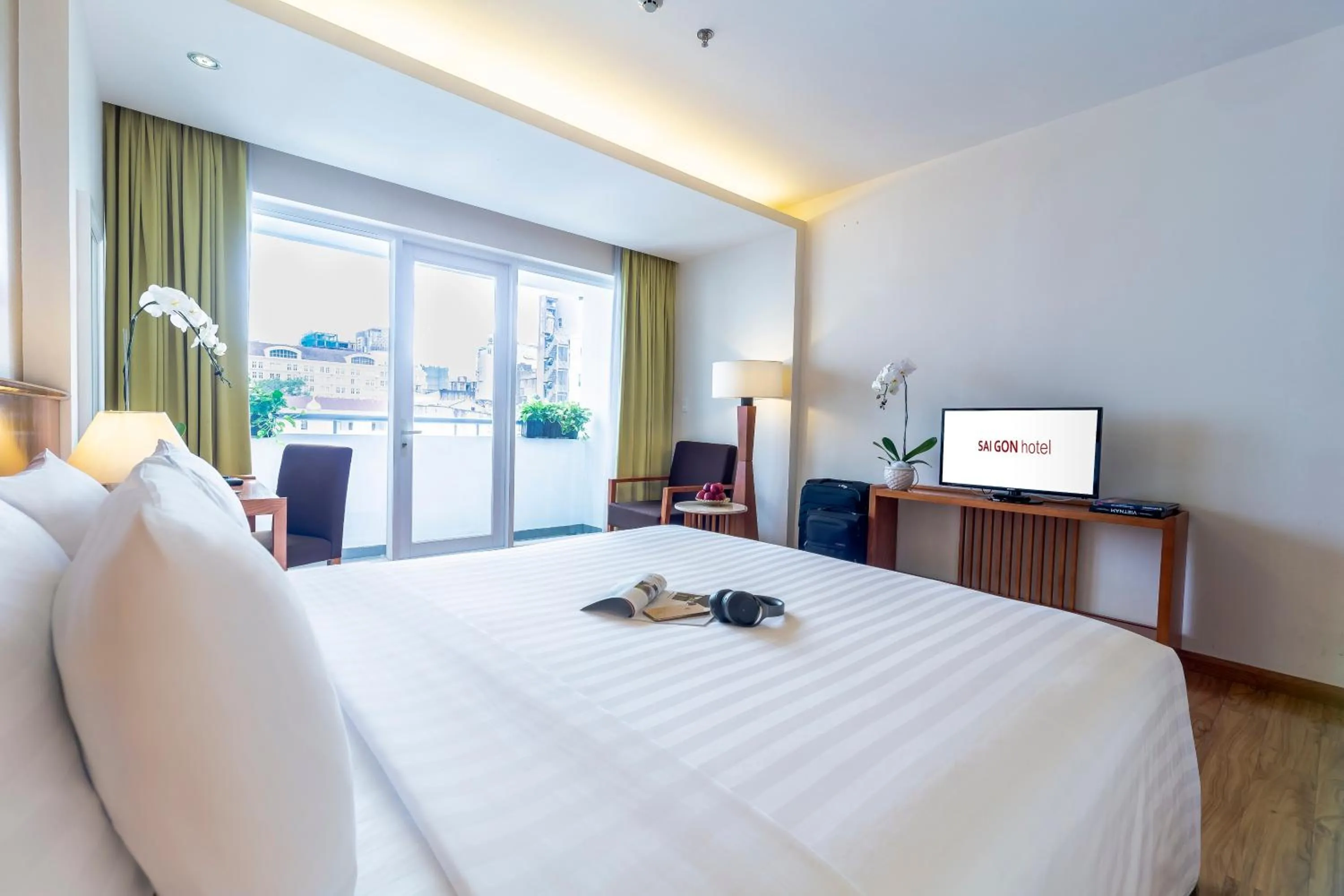 Photo of the whole room, Bed in Saigon Hotel