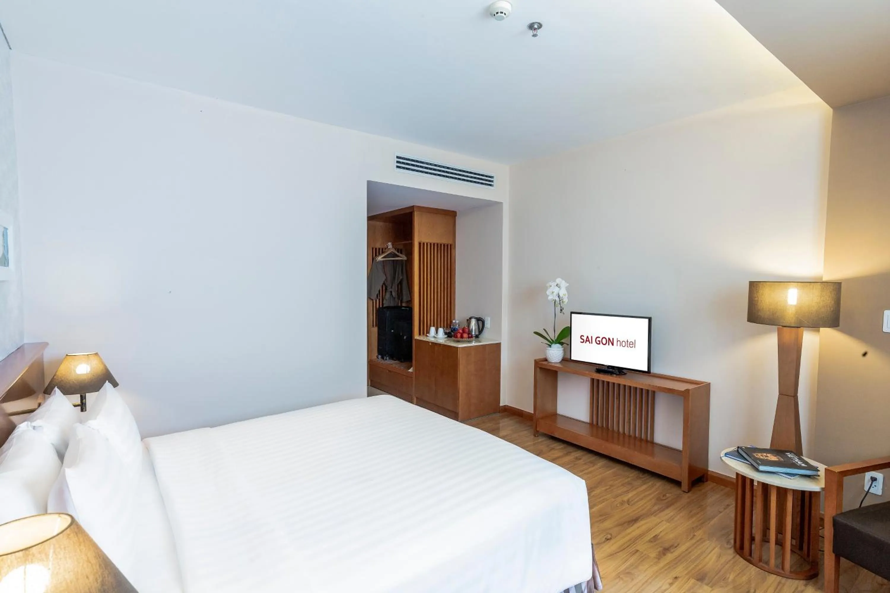 Photo of the whole room, Bed in Saigon Hotel