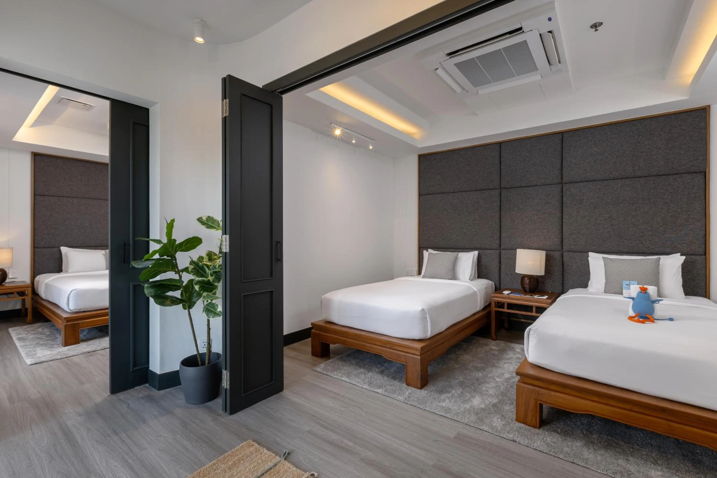 Bed in Baan Laimai Beach Resort & Spa - SHA Extra Plus