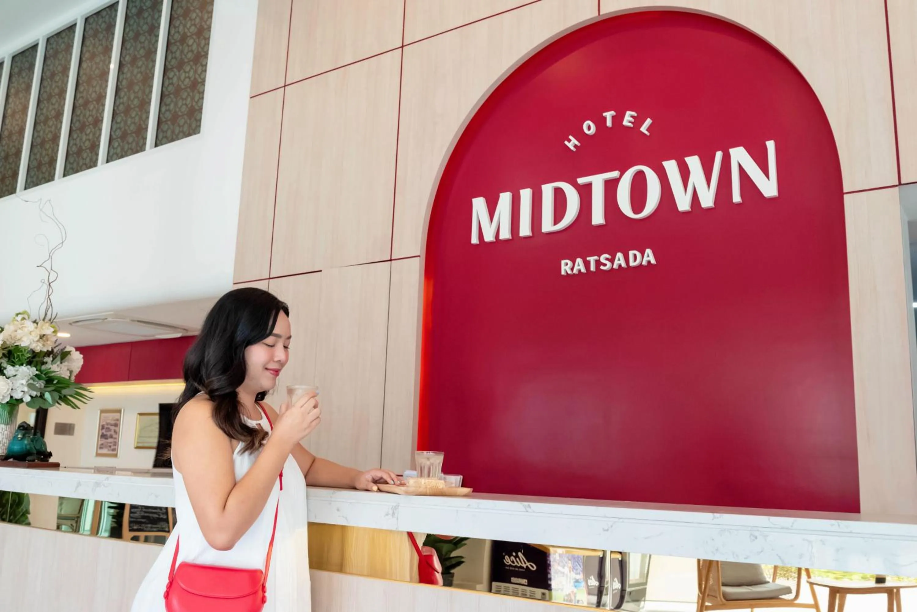 Property logo or sign in Hotel Midtown Ratsada