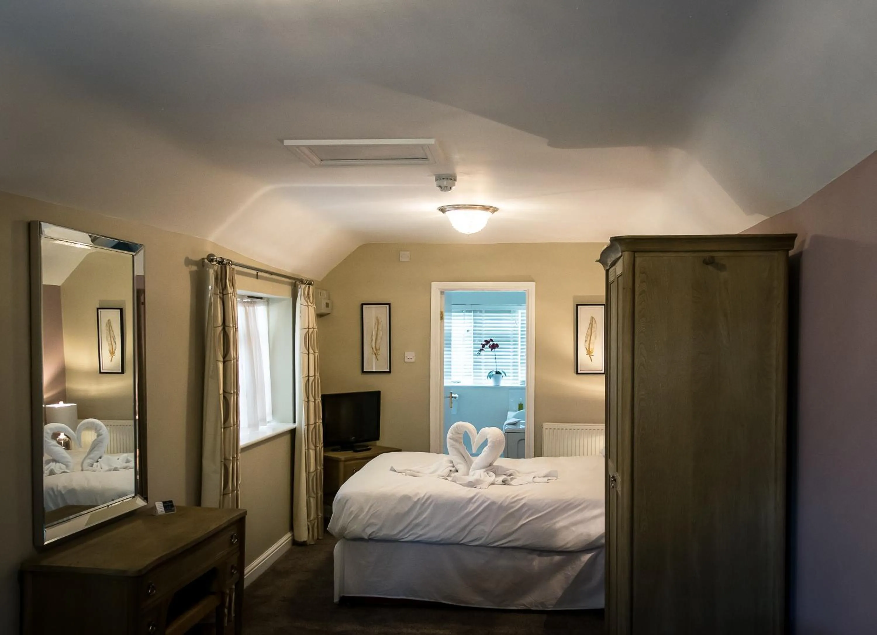 Bed in The Cottage Hotel