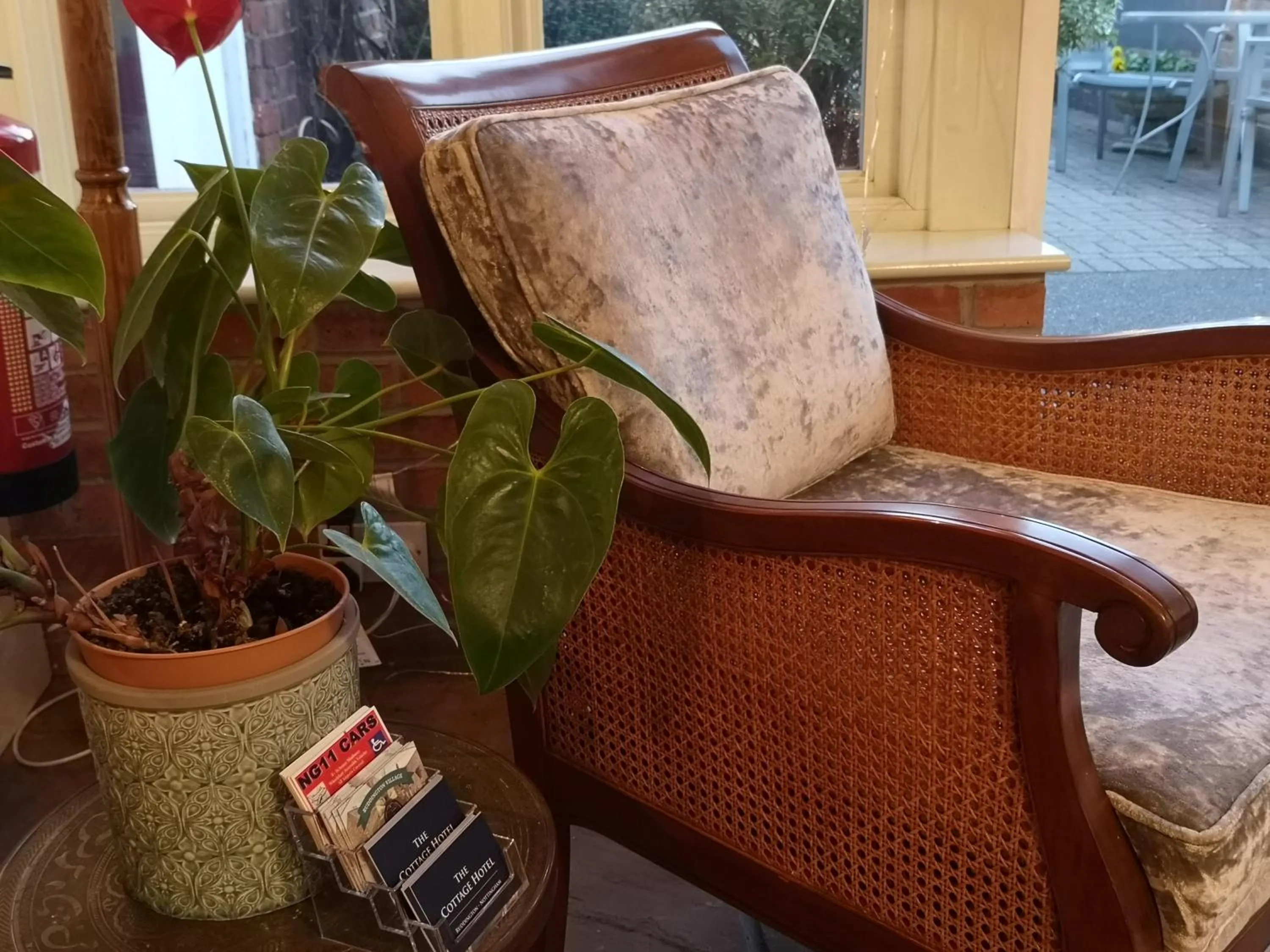 Lobby or reception in The Cottage Hotel