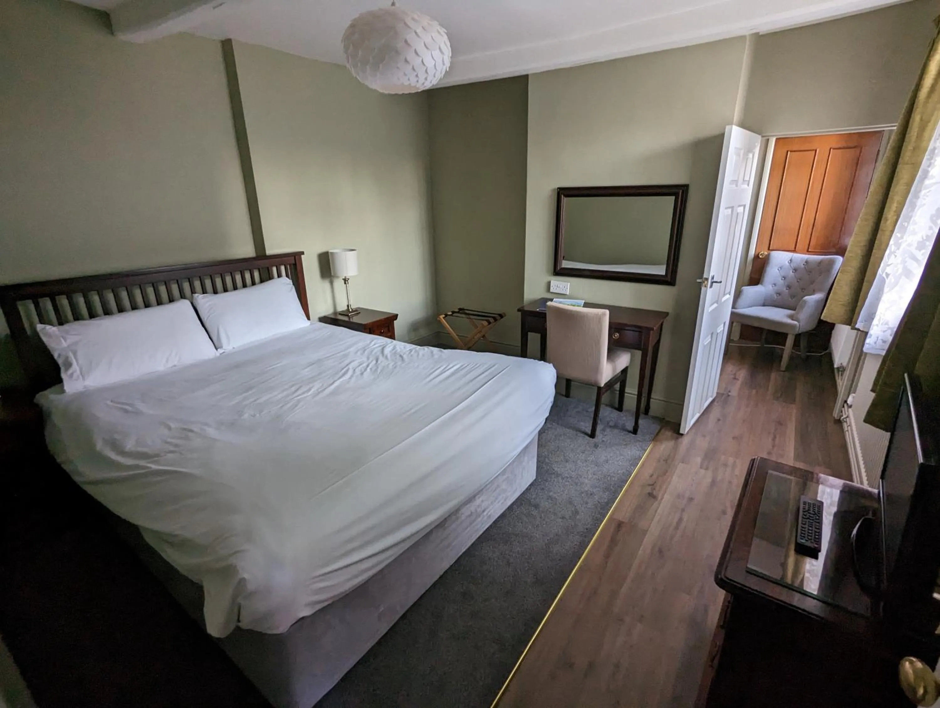 Bed in The Cottage Hotel