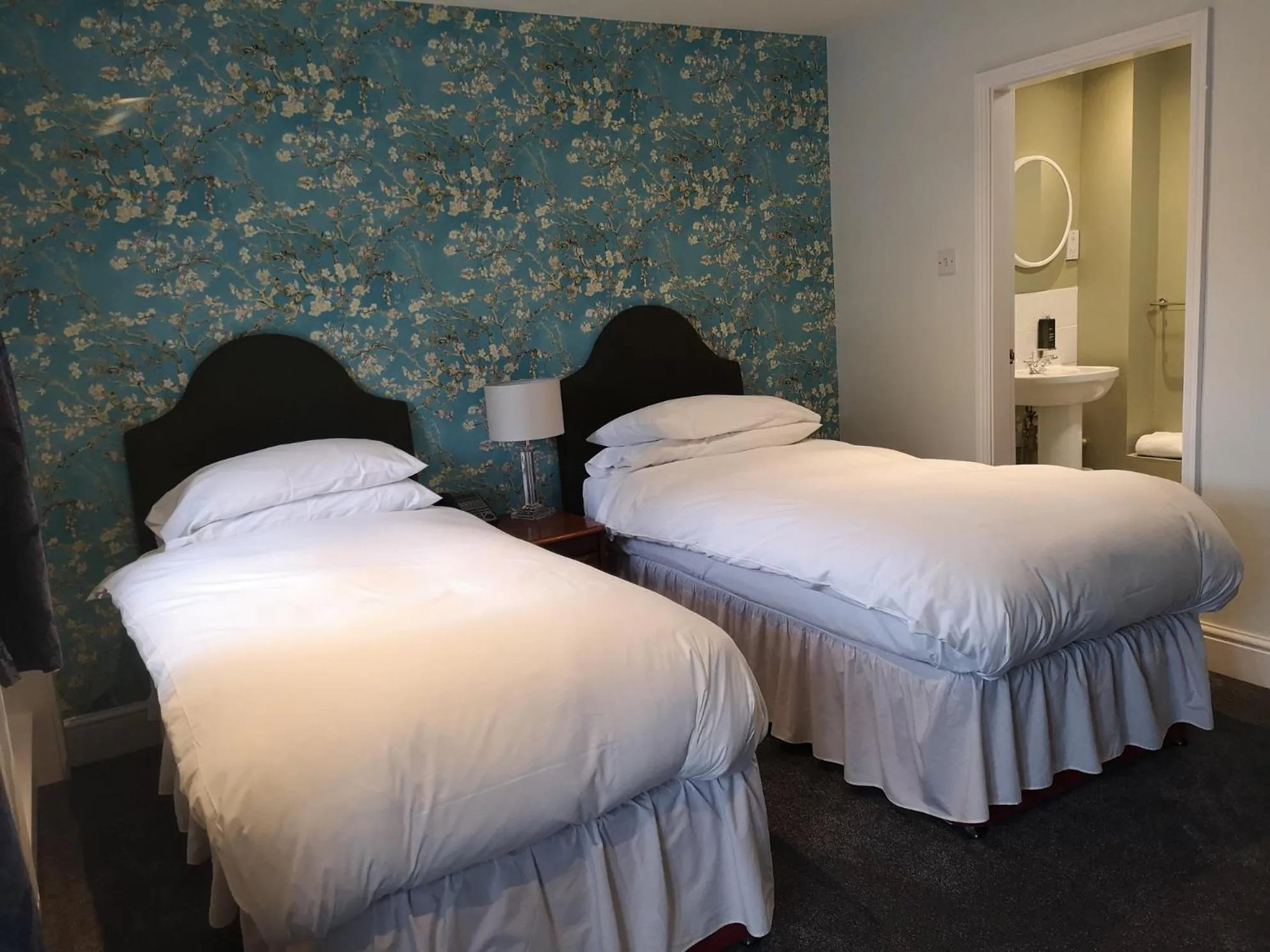 Bed in The Cottage Hotel