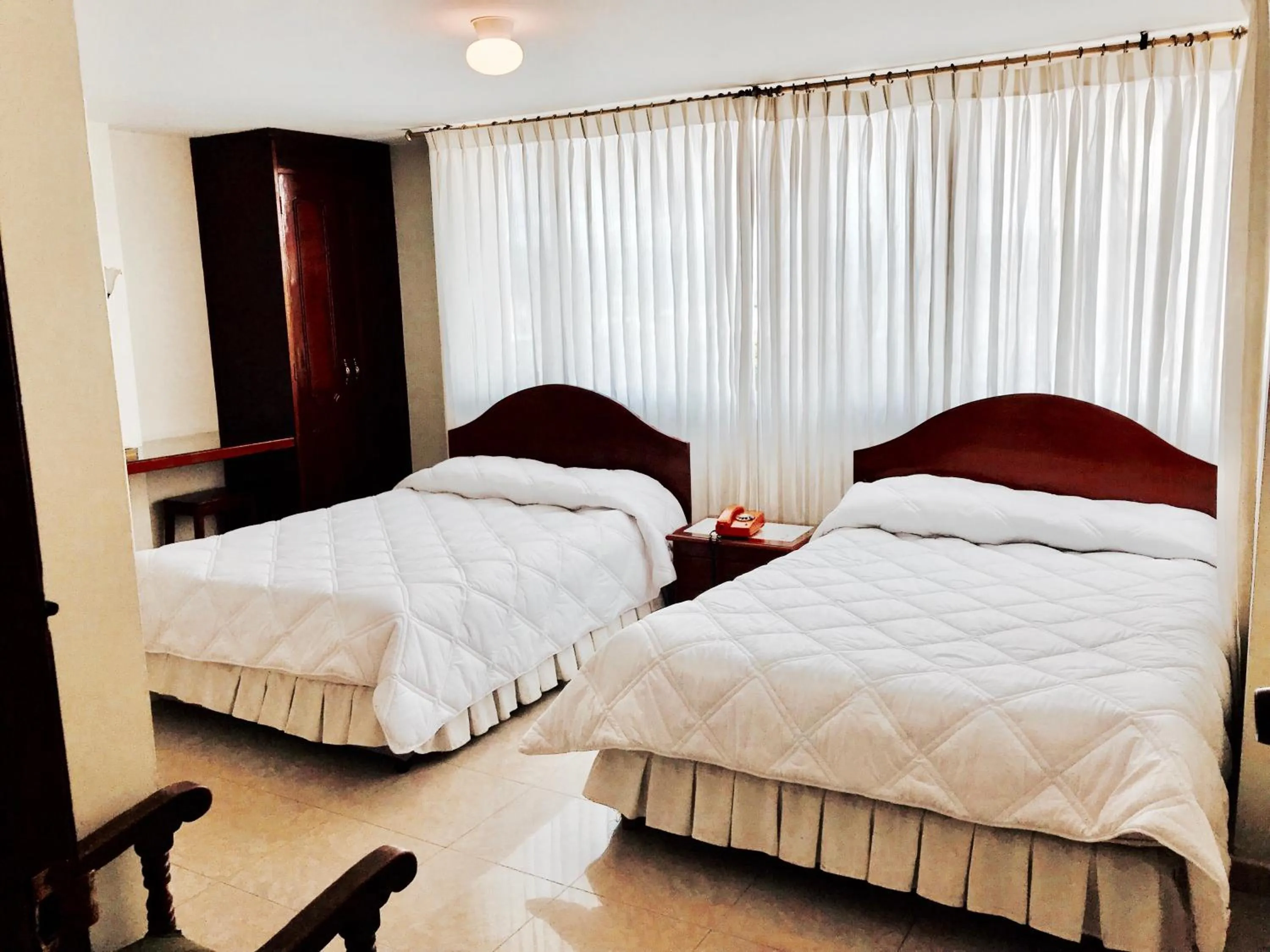 Bed in Hotel Azuay