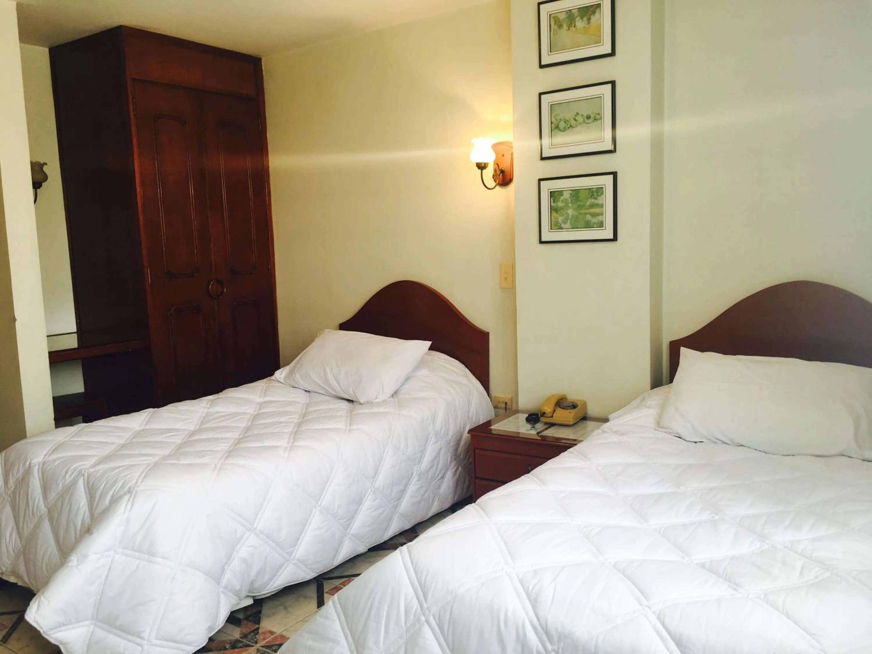 Bed in Hotel Azuay