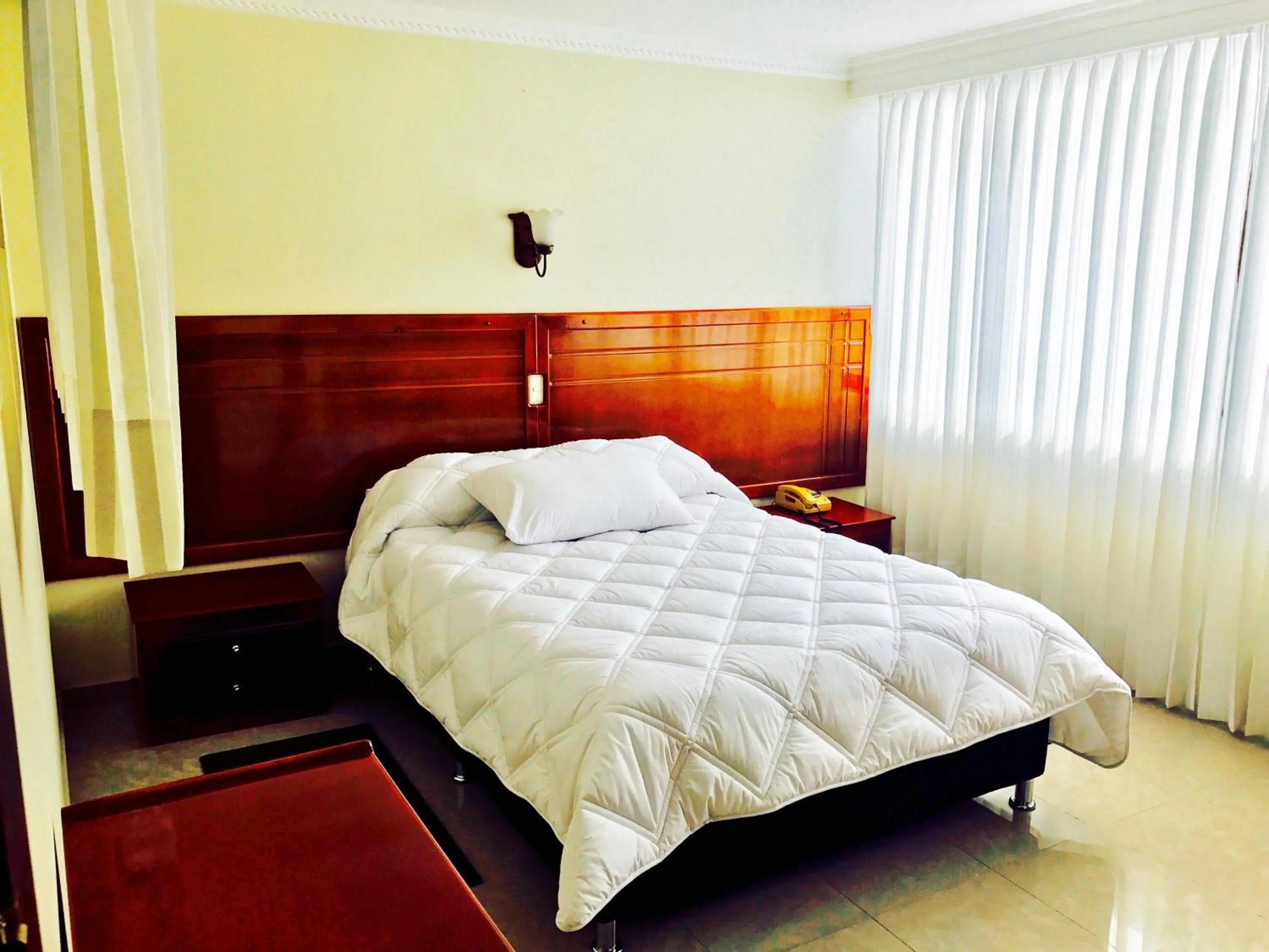 Bed in Hotel Azuay