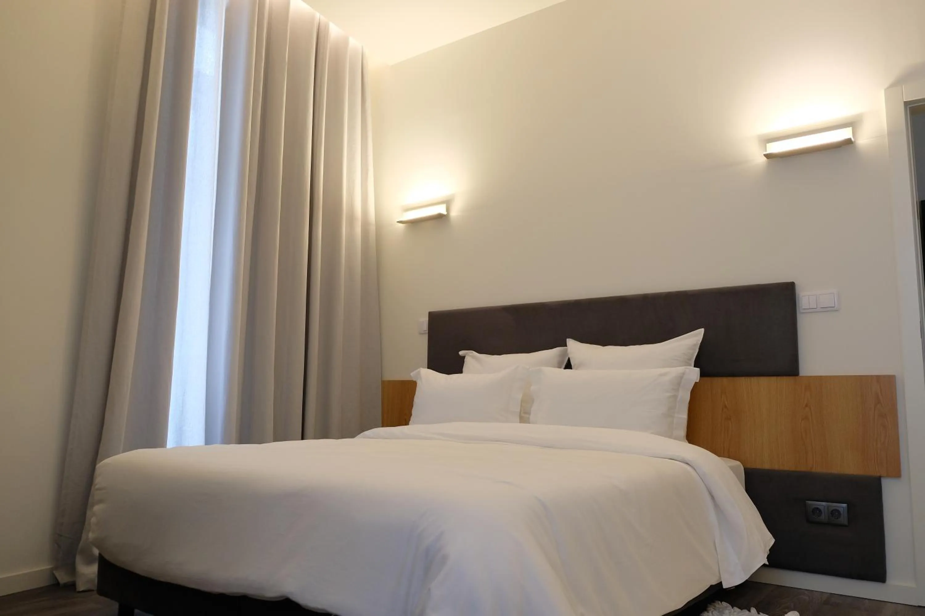 Bed in LETHESHOME Apartments