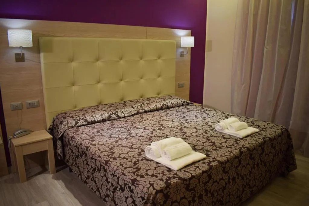 Bed in Hotel Baffo Rosso