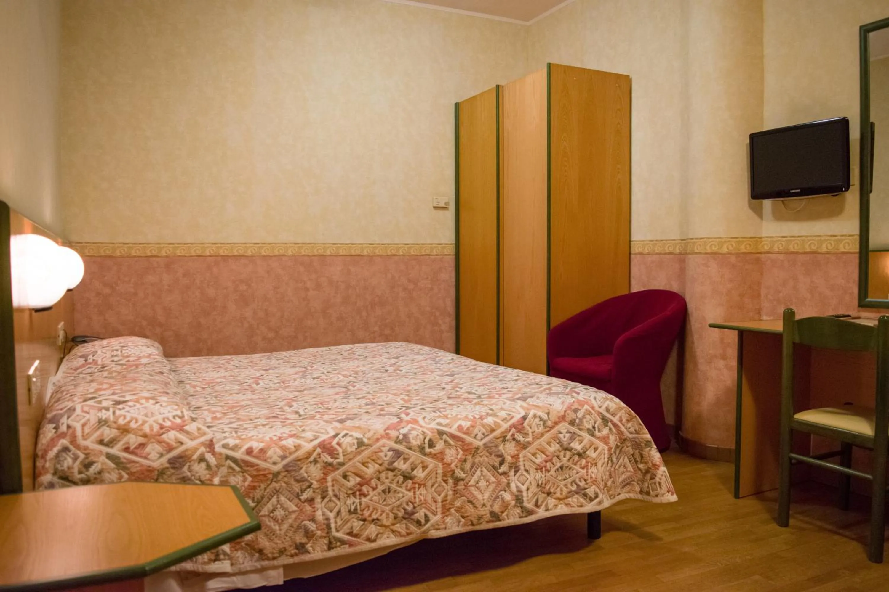 Bed in Hotel Baffo Rosso