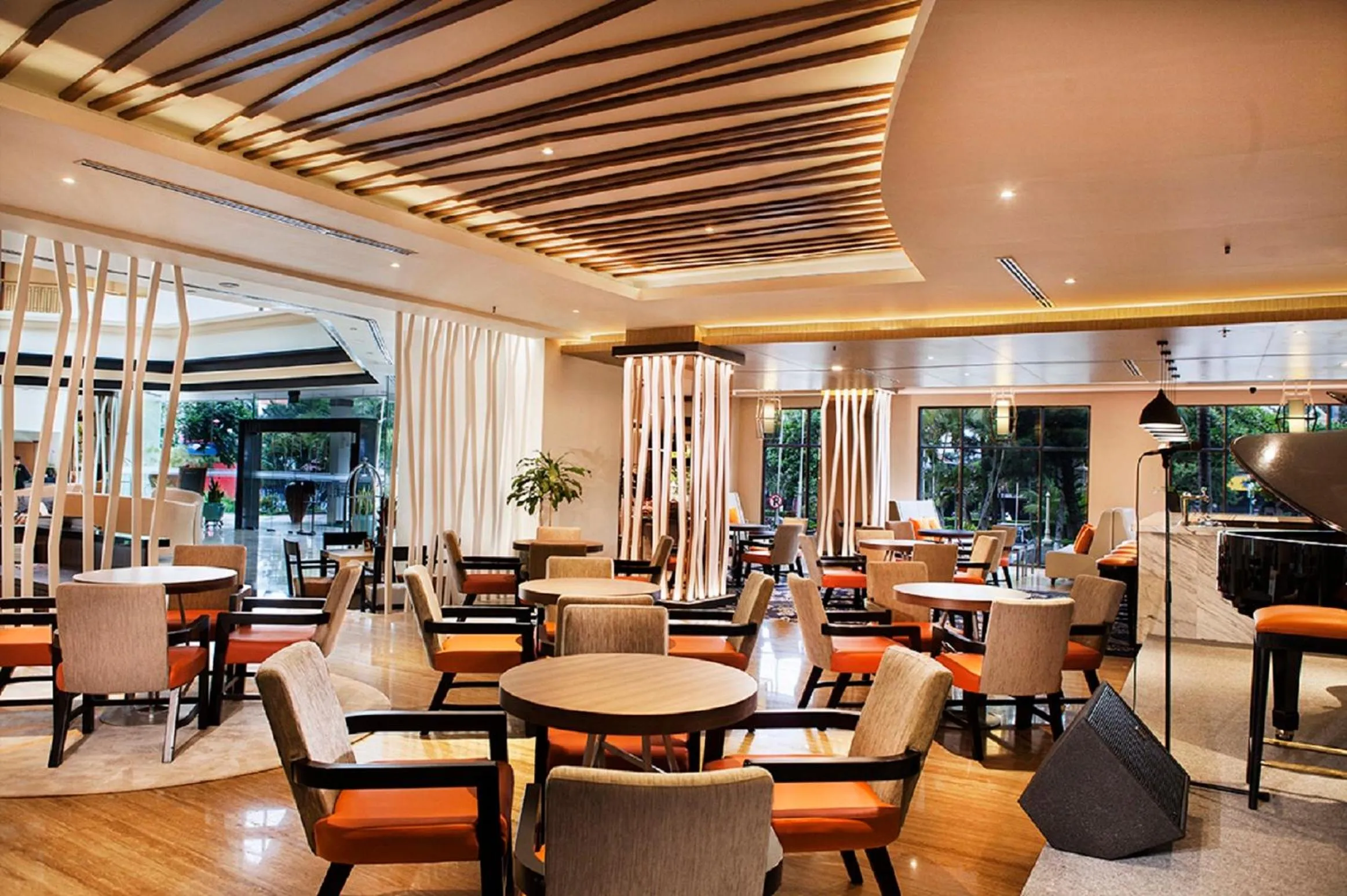 Communal lounge/ TV room in Grand Diamond Hotel Yogyakarta